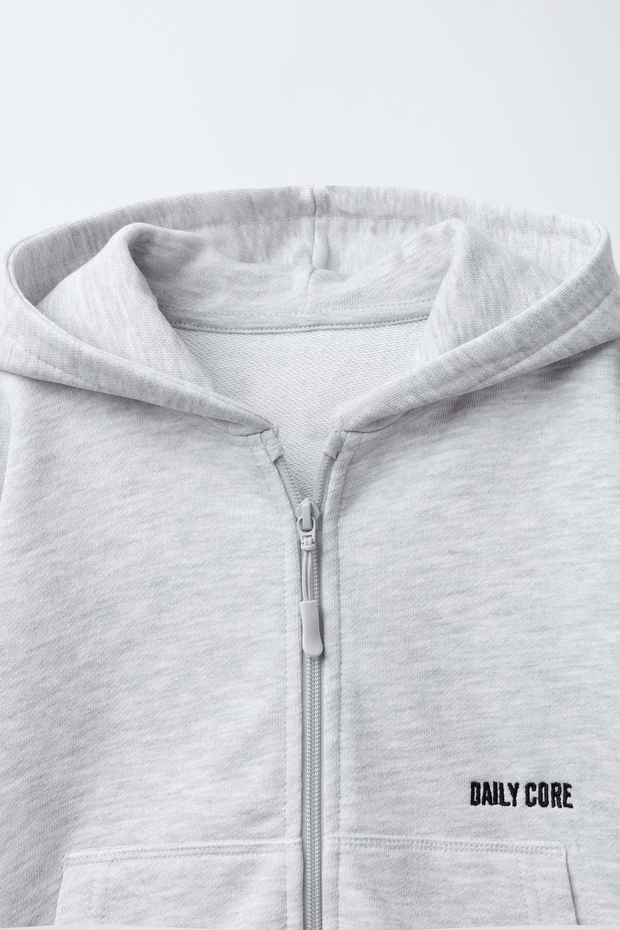 EMBROIDERED TEXT HOODED SWEATSHIRT