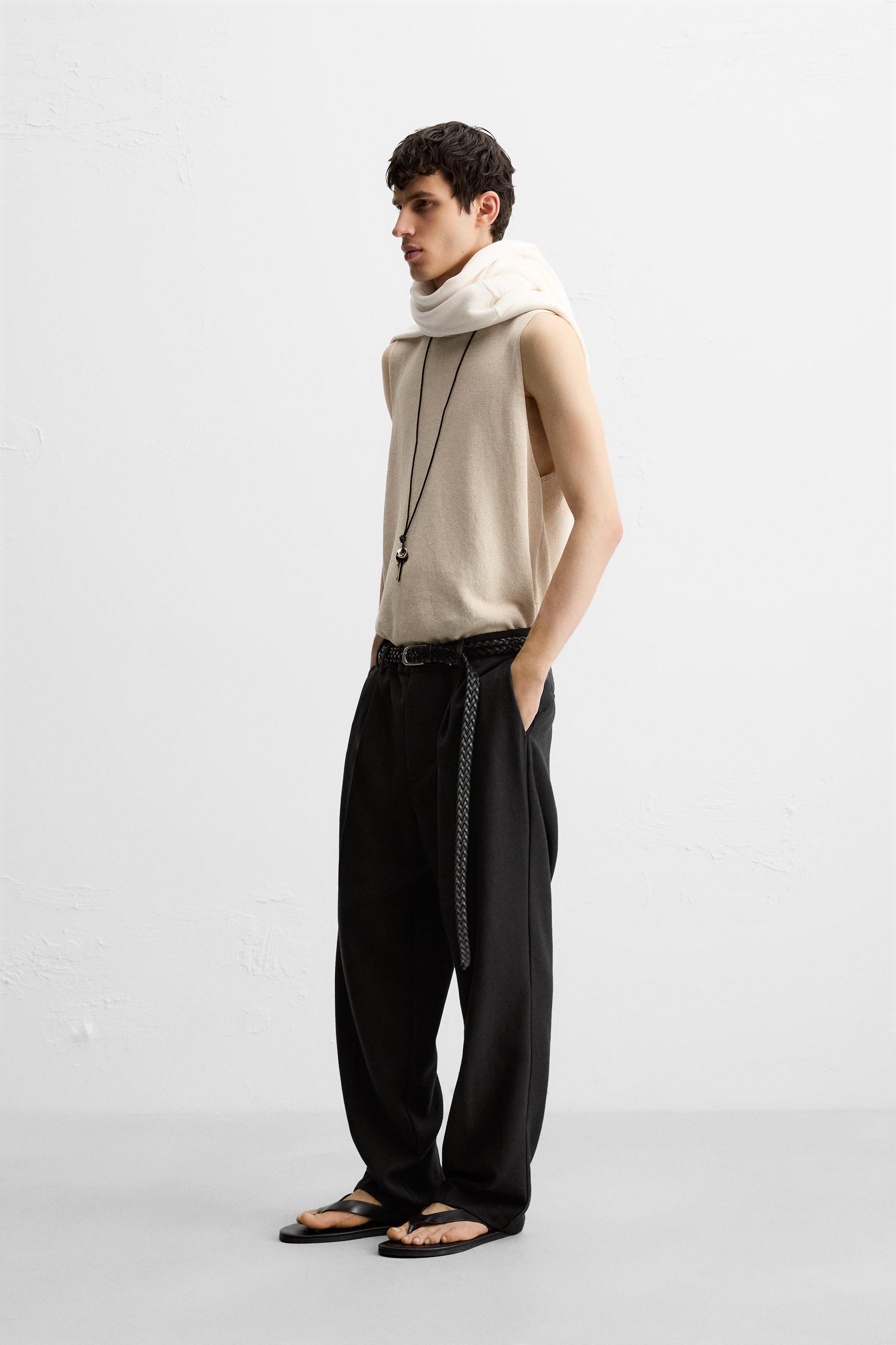 PLEATED RELAXED FIT PANTS