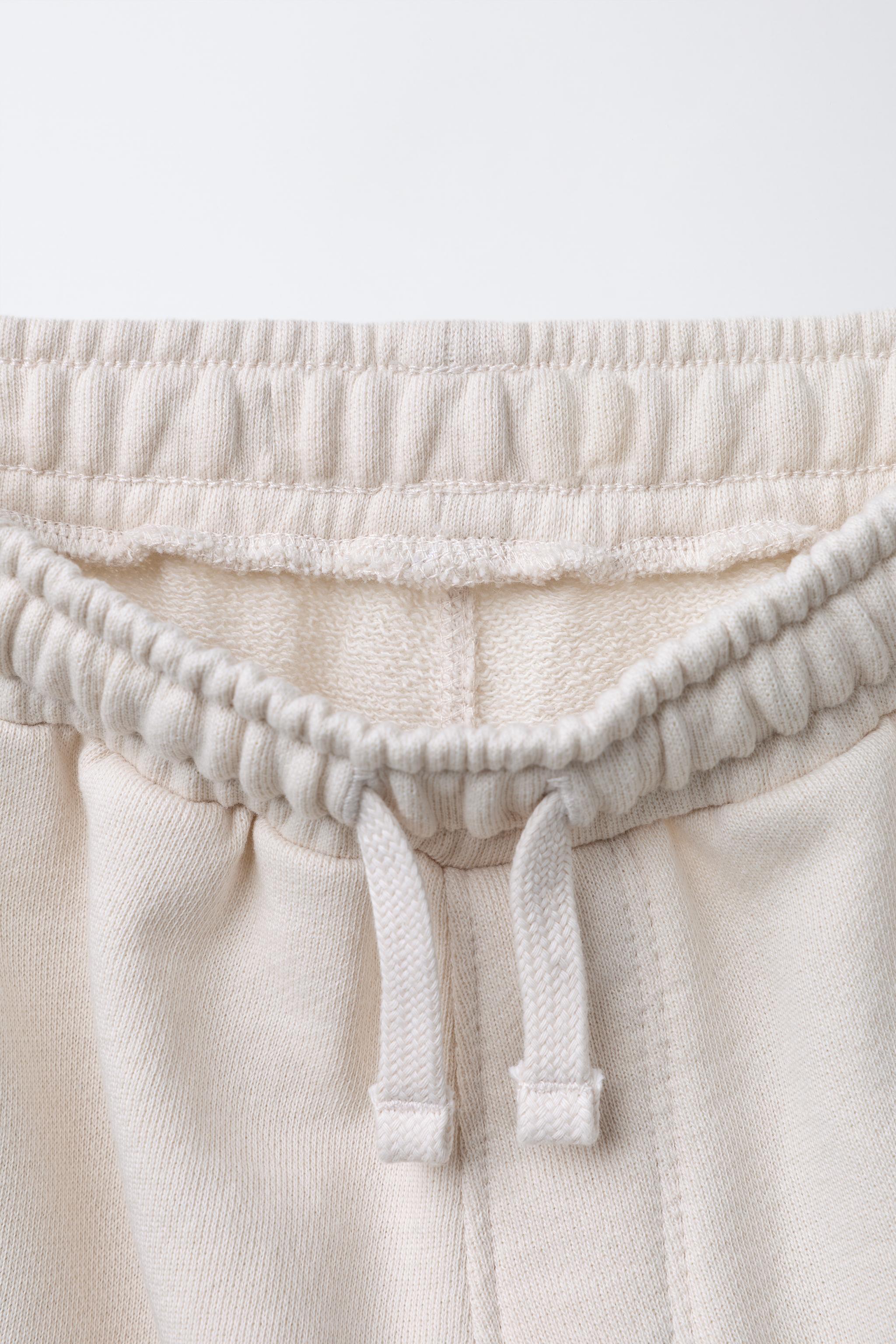 GRAFFITI PRINT JOGGER PANTS