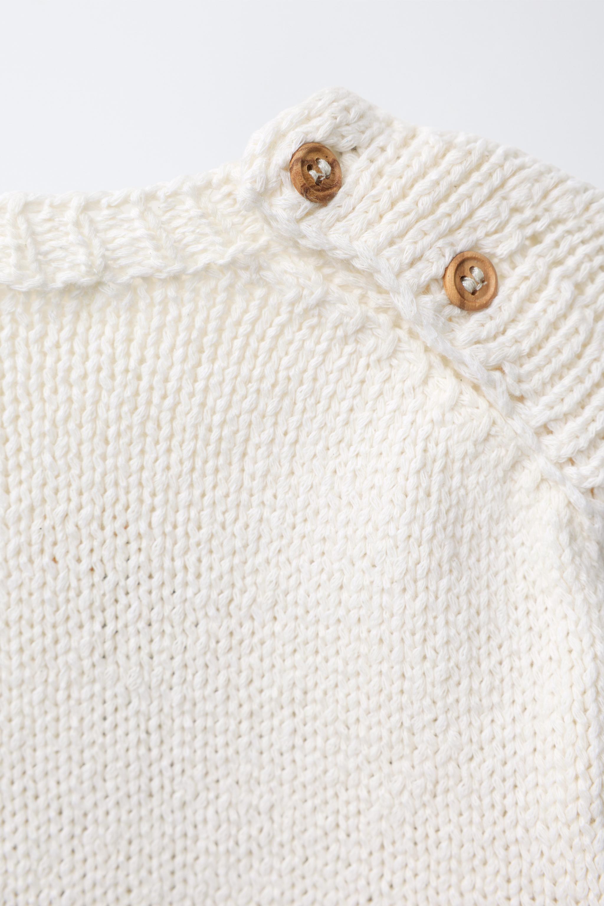 EMBROIDERED ELEPHANT KNIT SWEATER