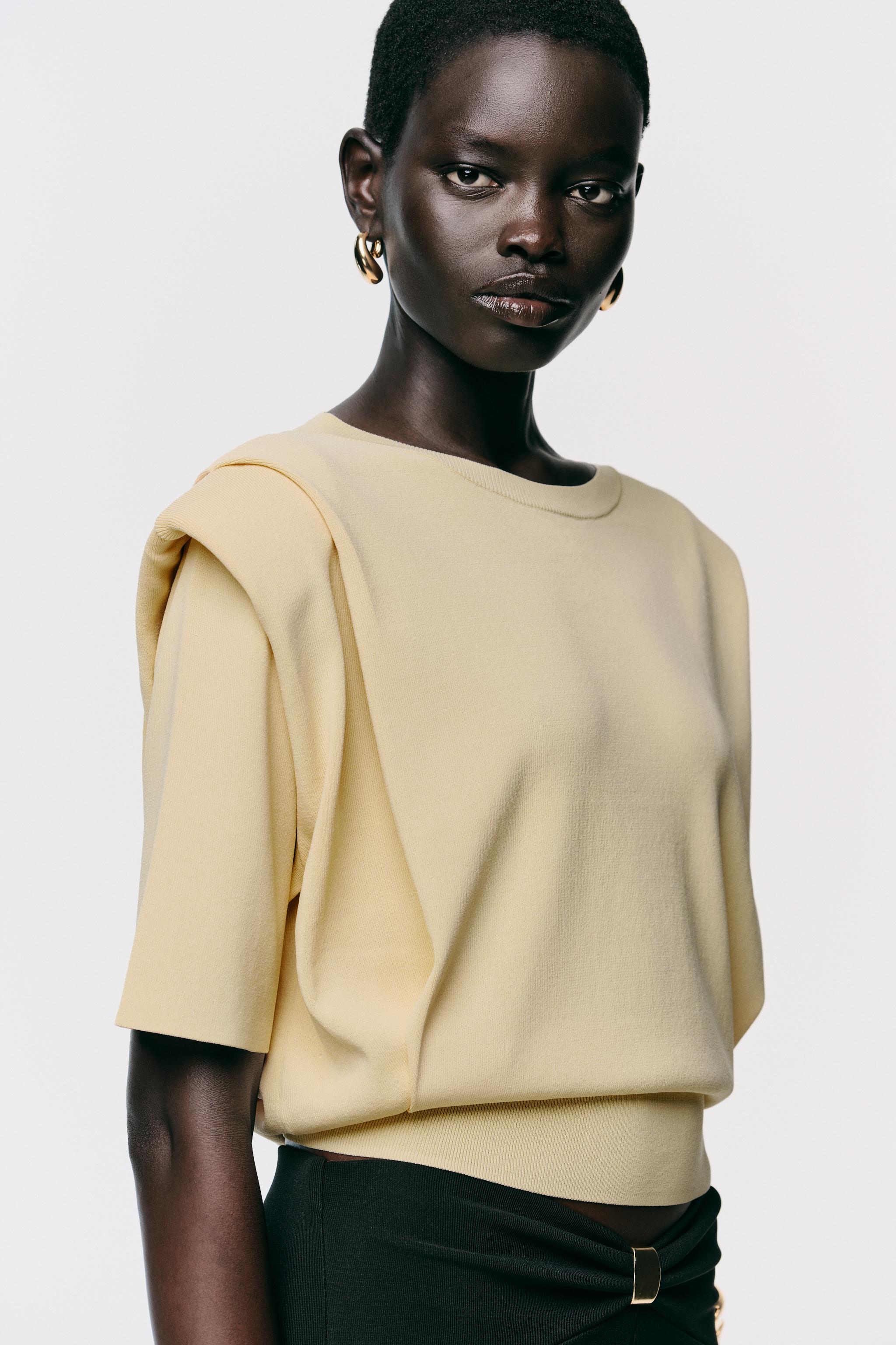 SHOULDER PAD KNIT TOP