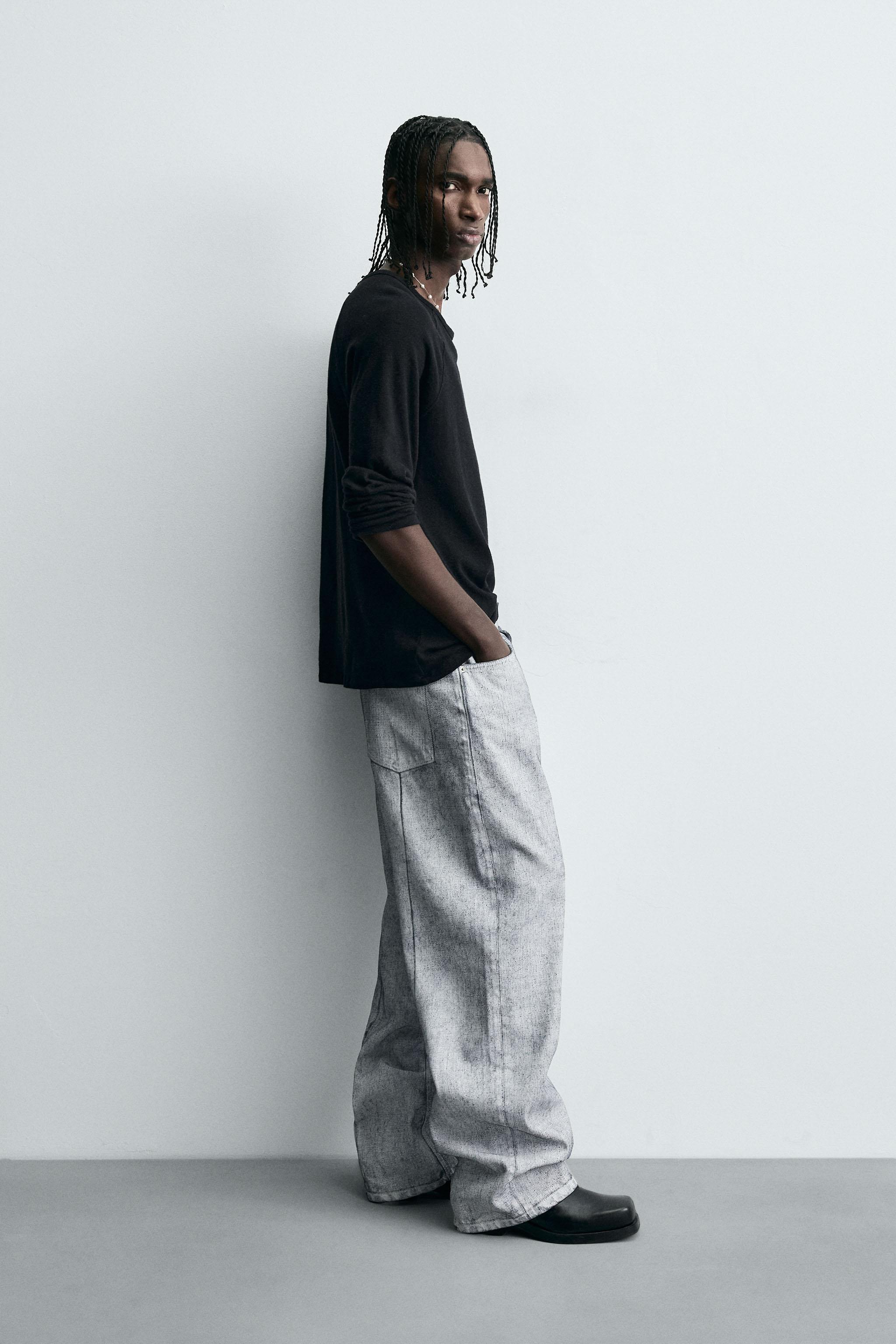 WAXED FINISH BAGGY FIT JEANS
