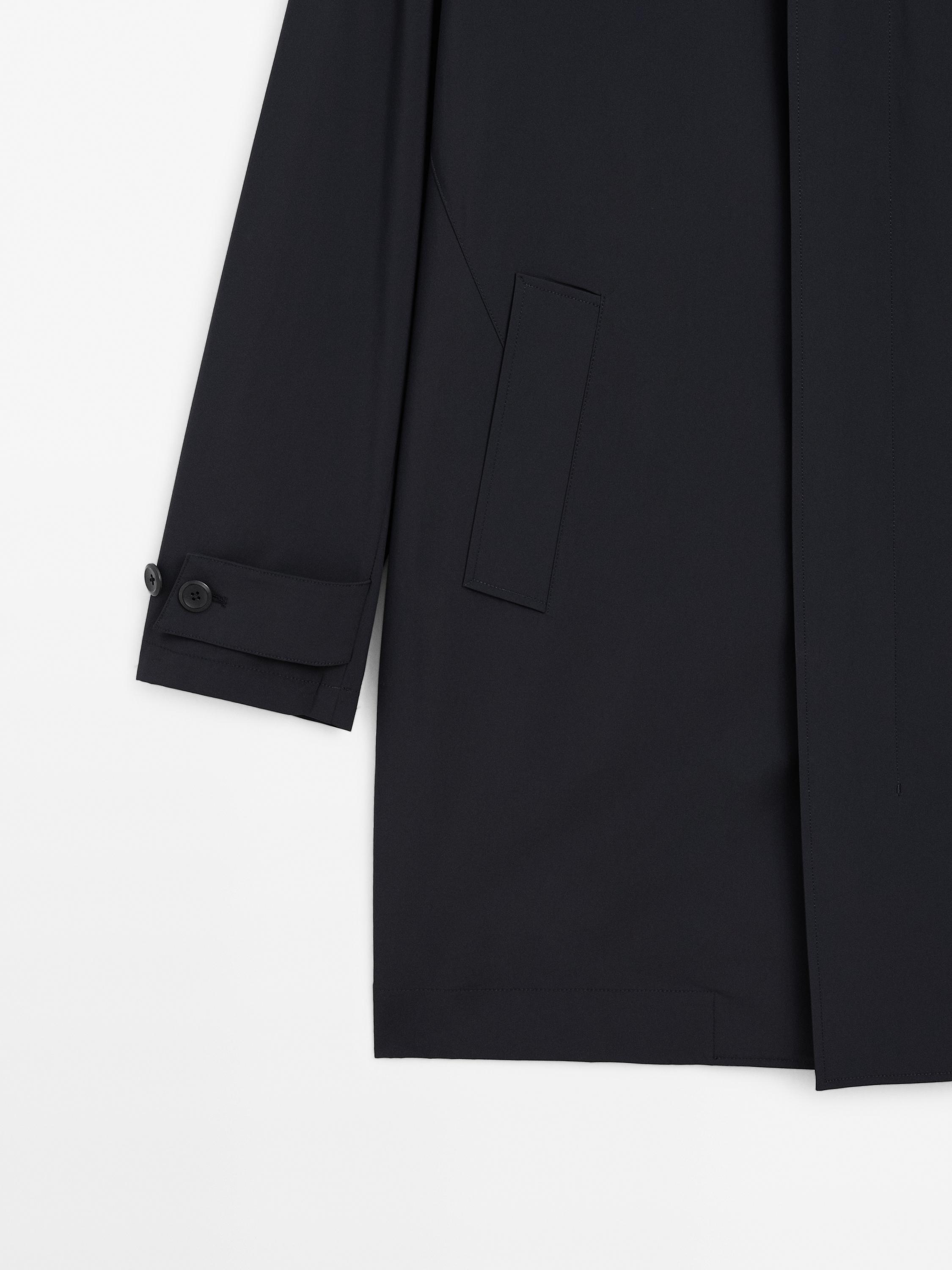Lightweight trench coat with hidden buttons