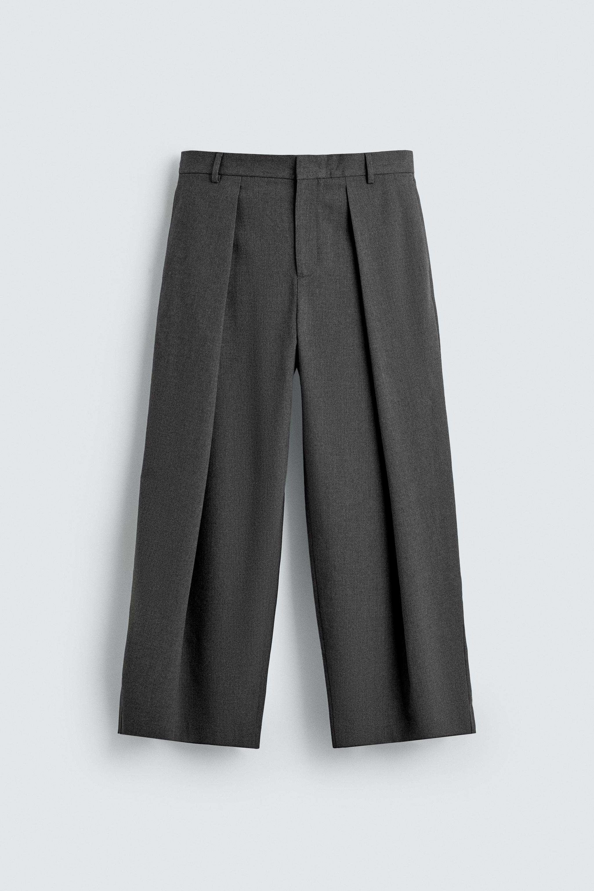 PLEATED WIDE FIT PANTS