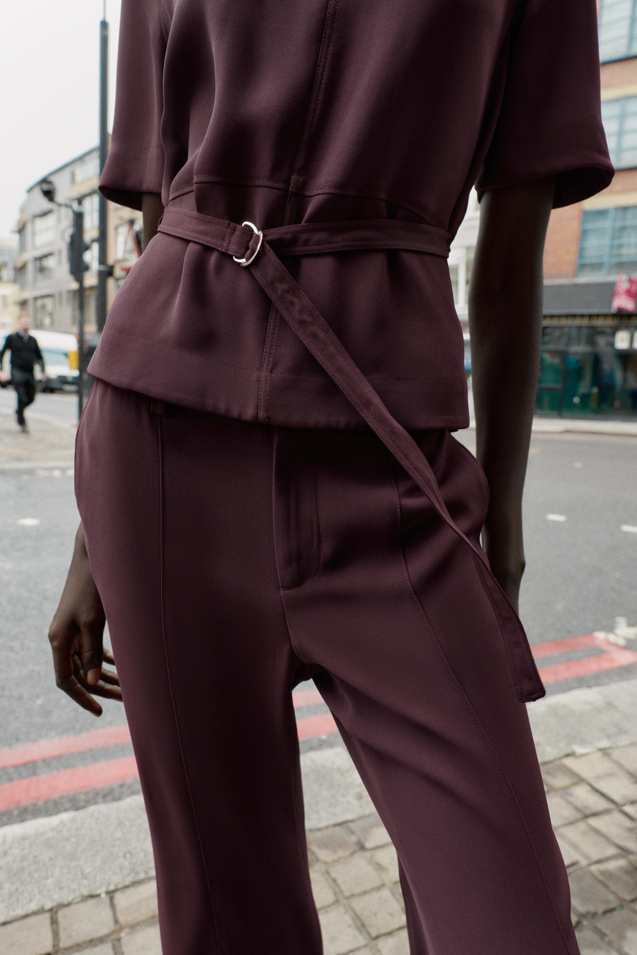 SHORT SLEEVE BELTED TOP