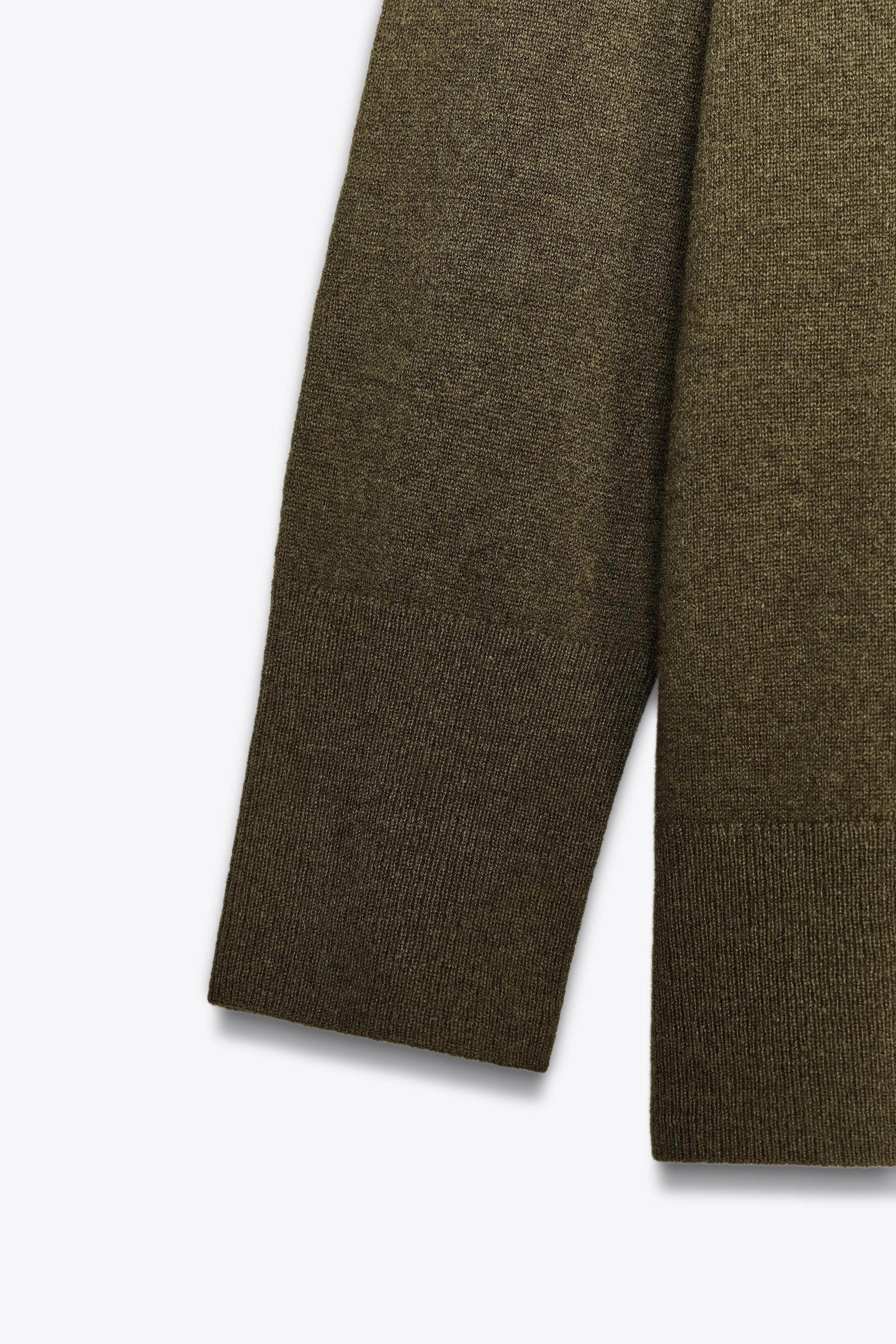 100% WOOL OVERSIZED KNIT SWEATER