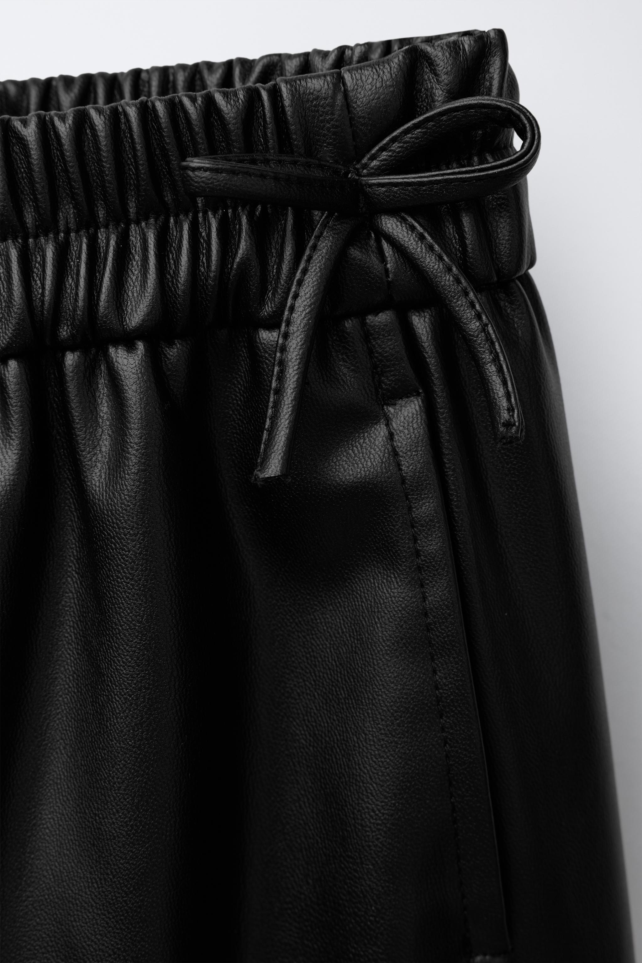 FAUX LEATHER BOW PANTS