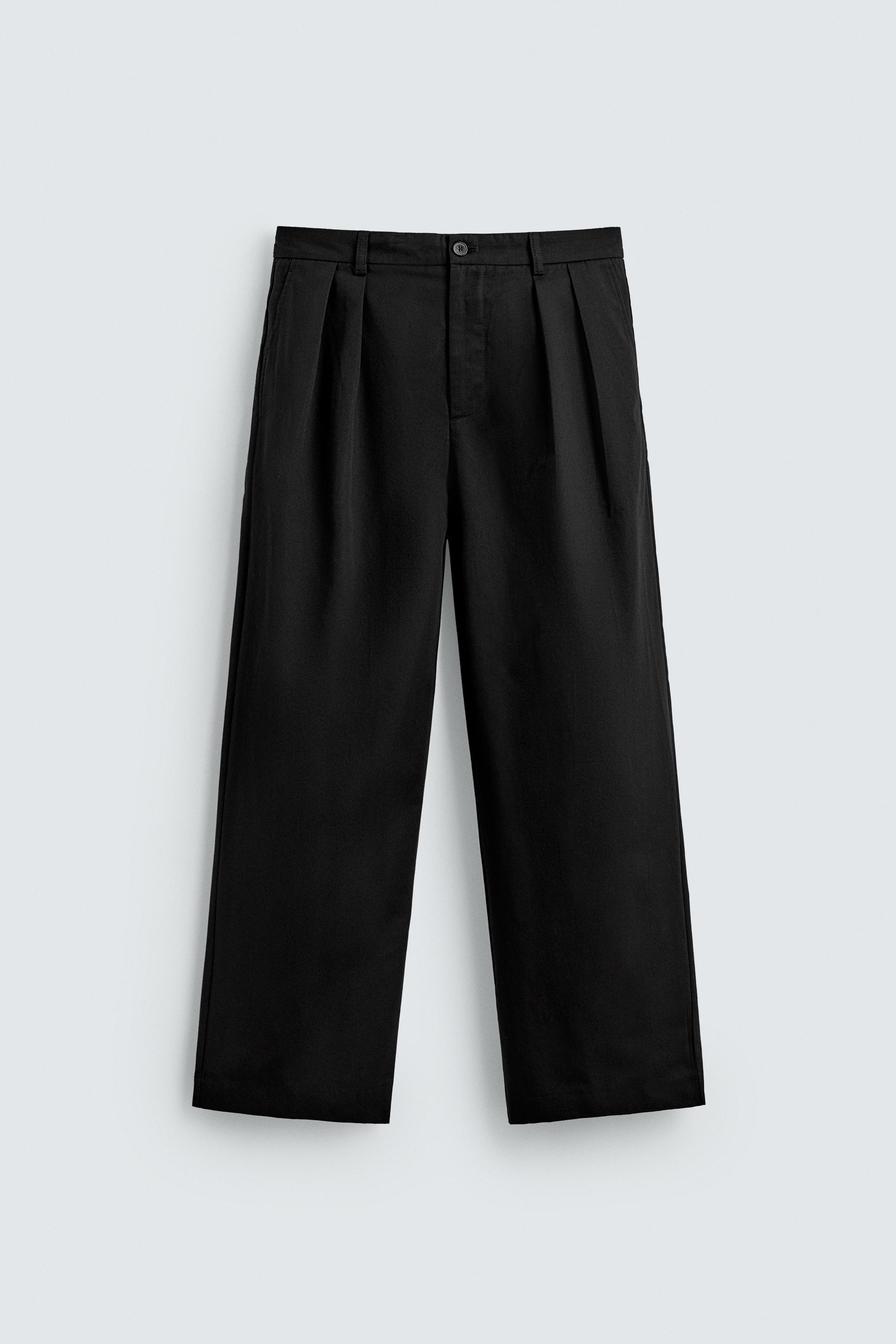 PLEATED WIDE FIT PANTS