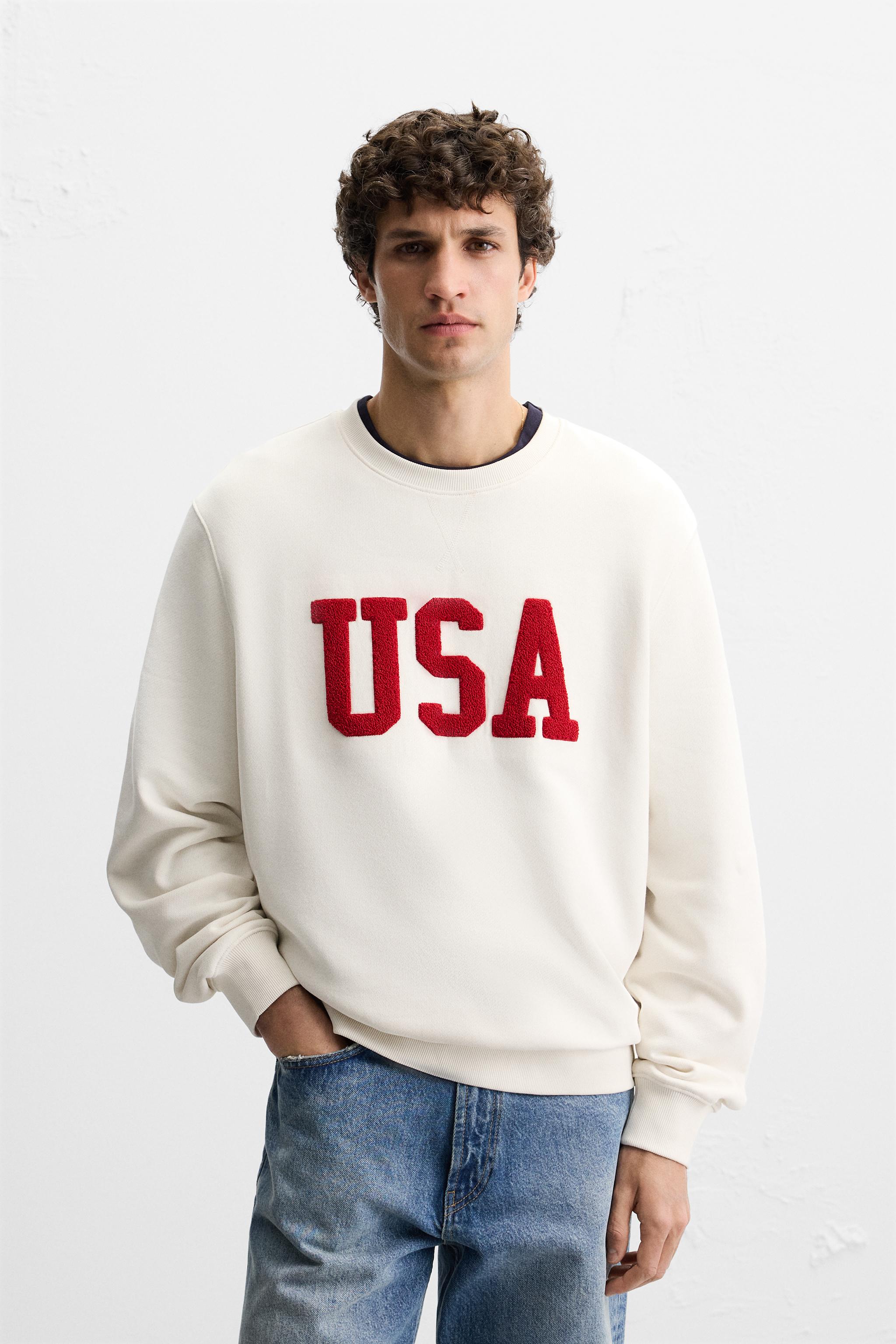TEXTURED PATCH SWEATSHIRT