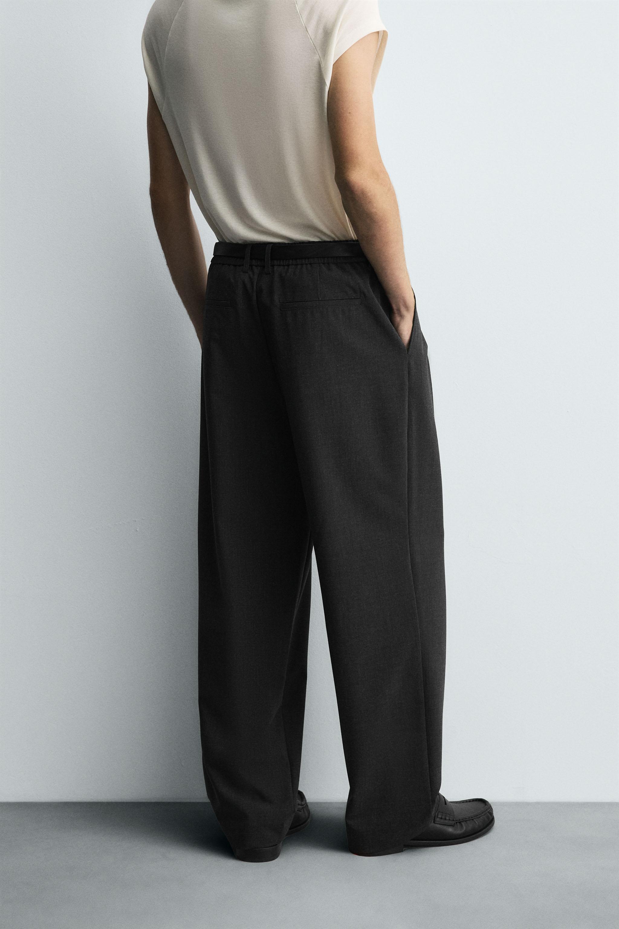 PLEATED WIDE FIT PANTS