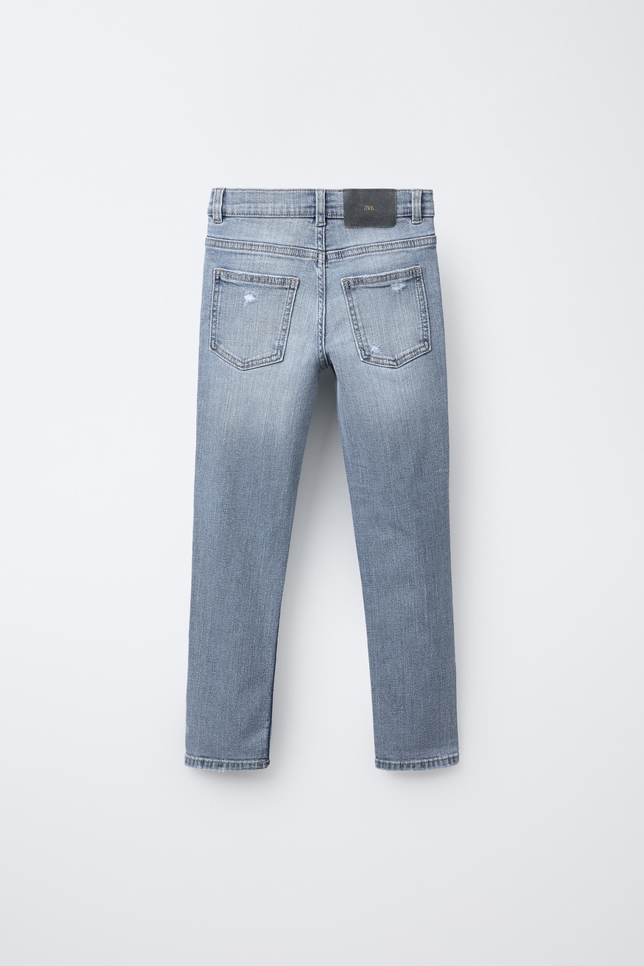 RIPPED SKINNY FIT JEANS