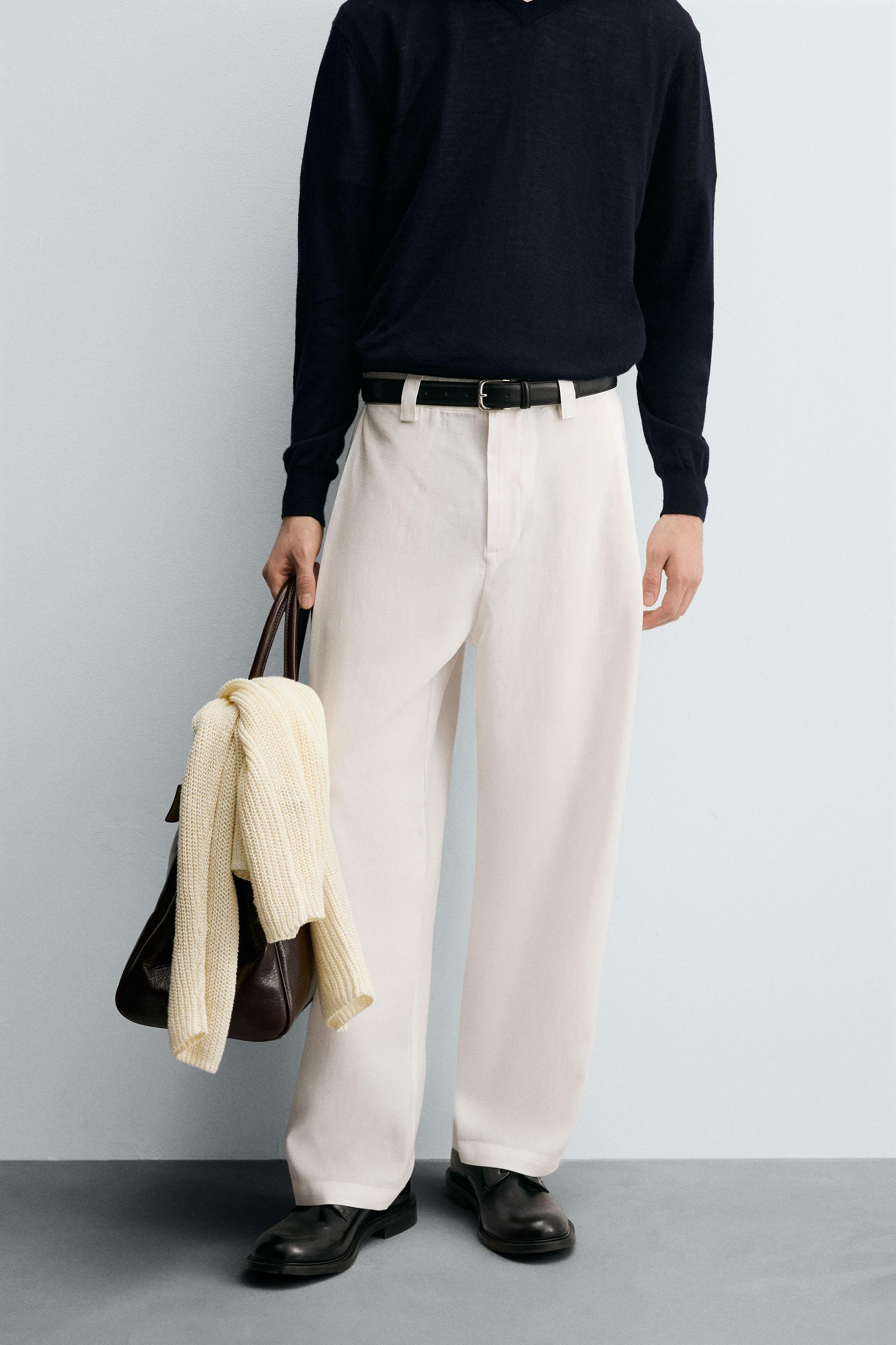 FLOWY PANTS WITH SIDE PLEATS