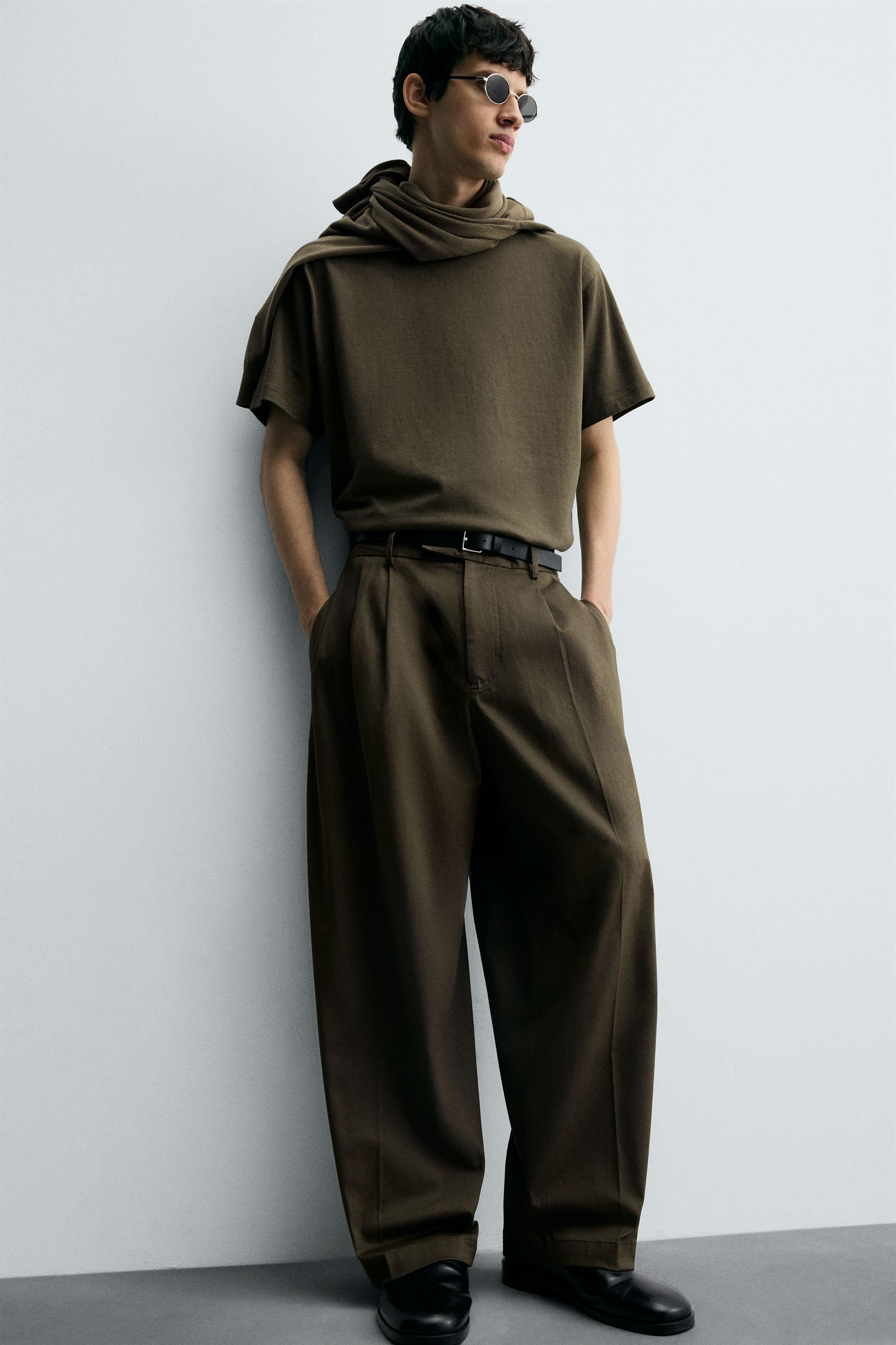 RELAXED FIT PLEATED PANTS
