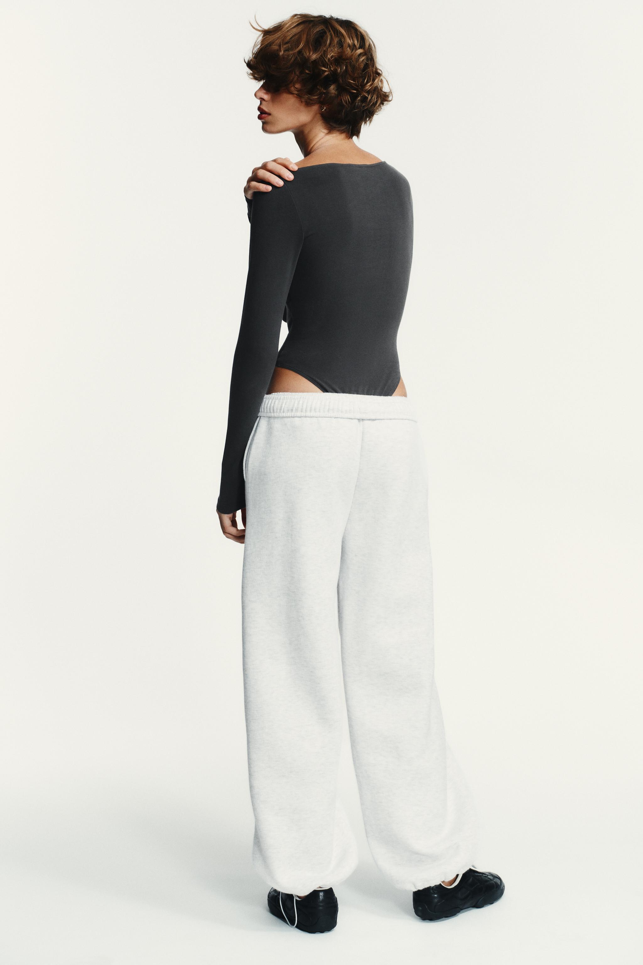 ASYMMETRIC LONG SLEEVE BODYSUIT