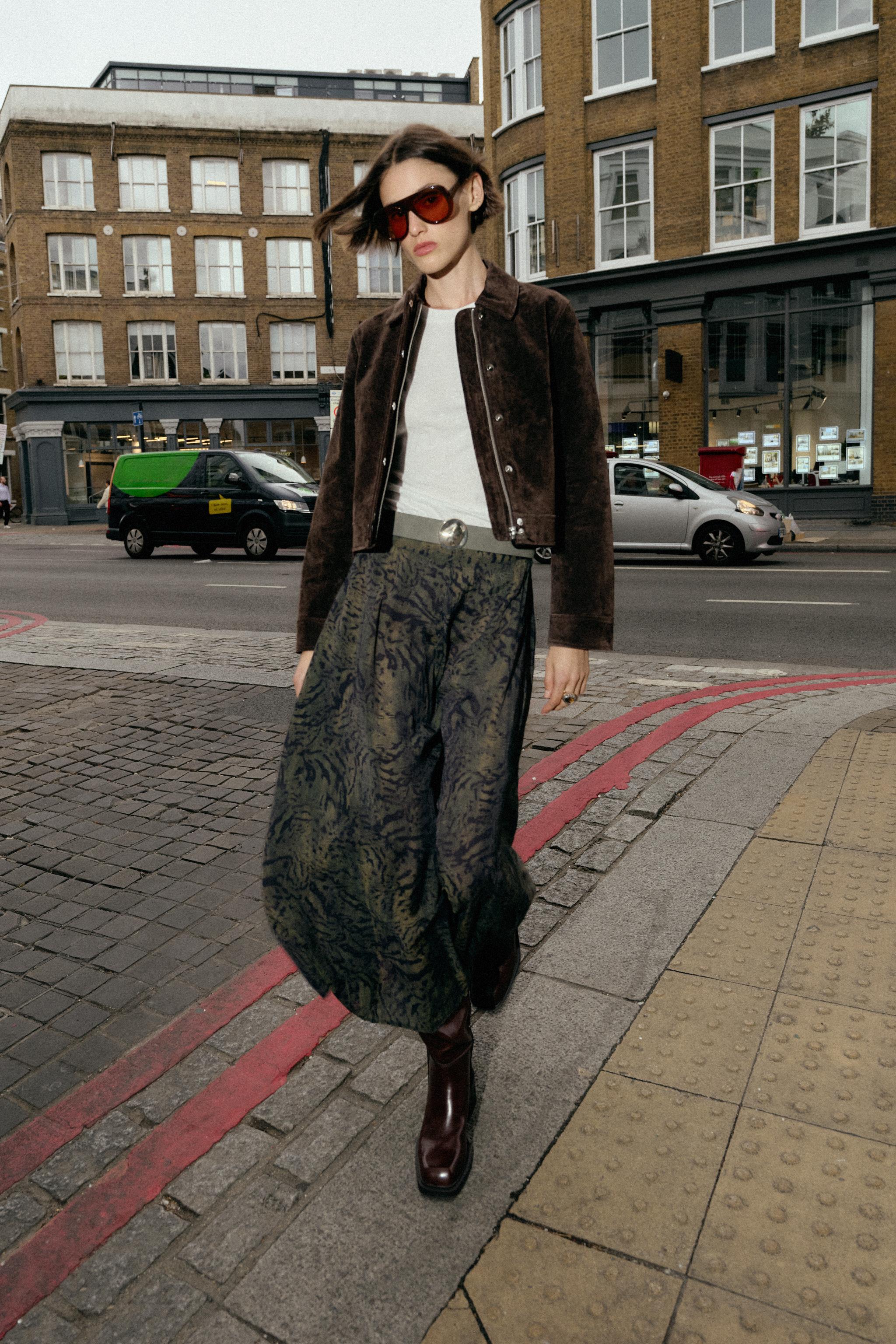 BELTED ANIMAL PRINT MIDI SKIRT