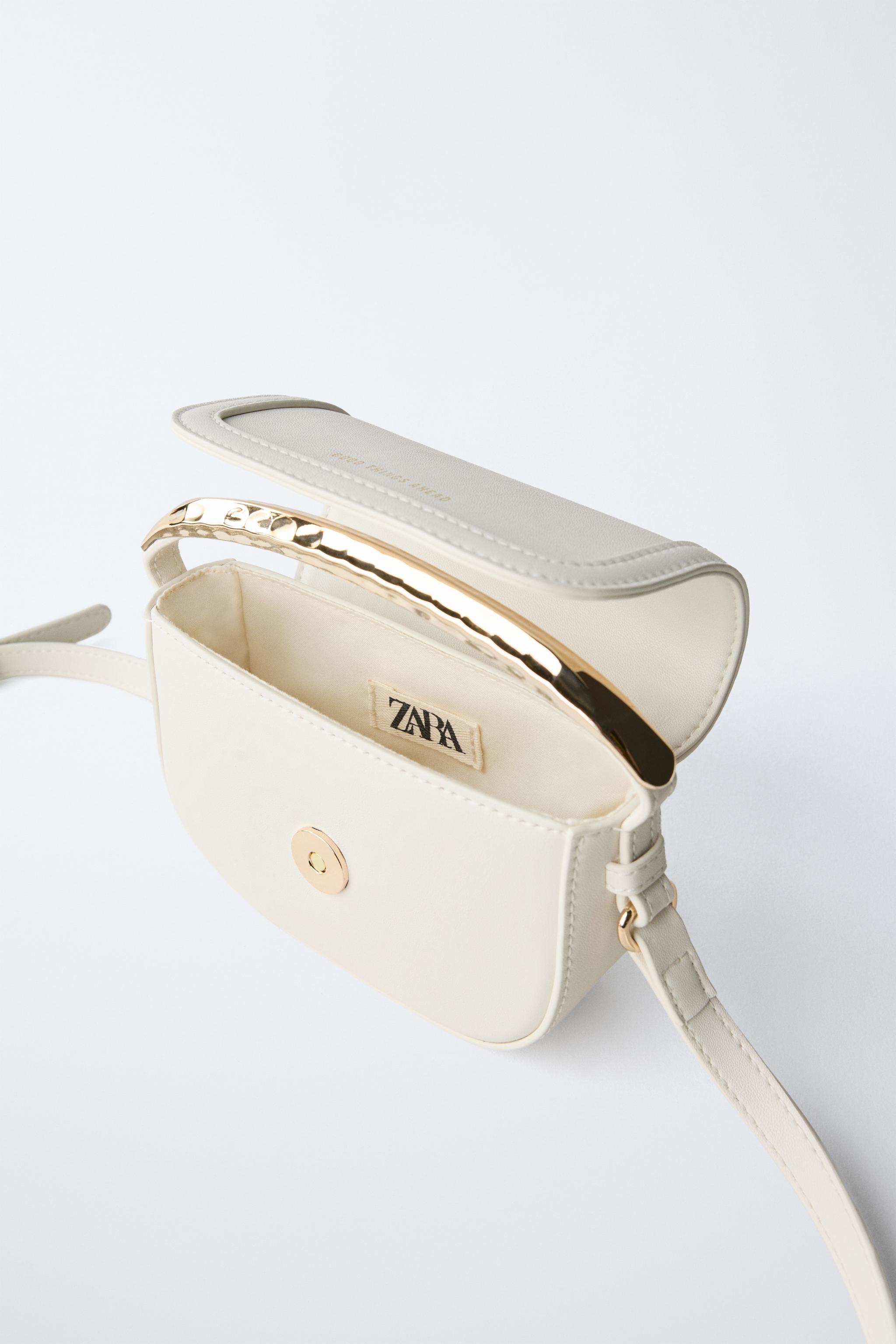 METALLIC HANDLE CROSSBODY BAG