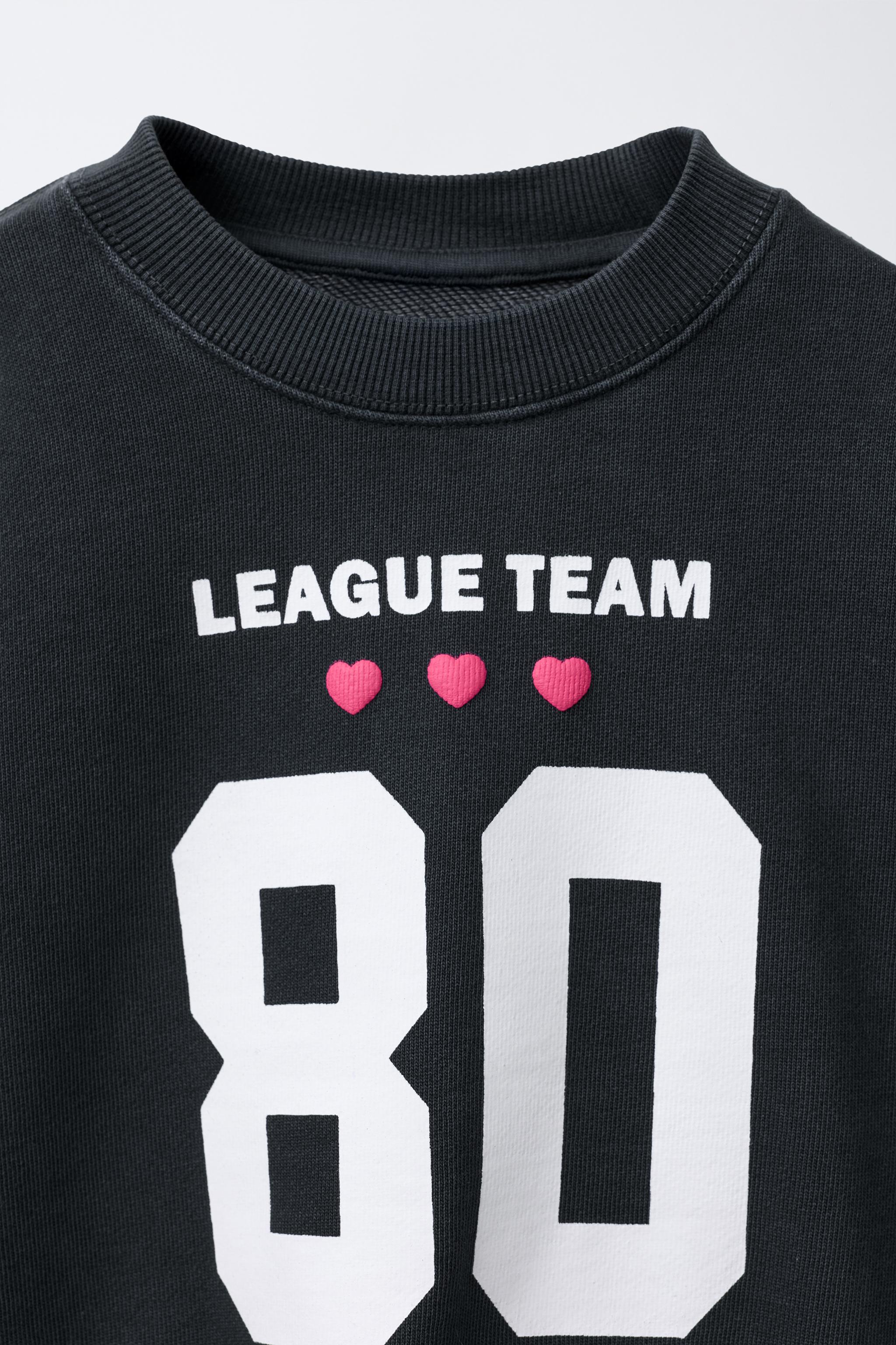 VARSITY PRINT SWEATSHIRT