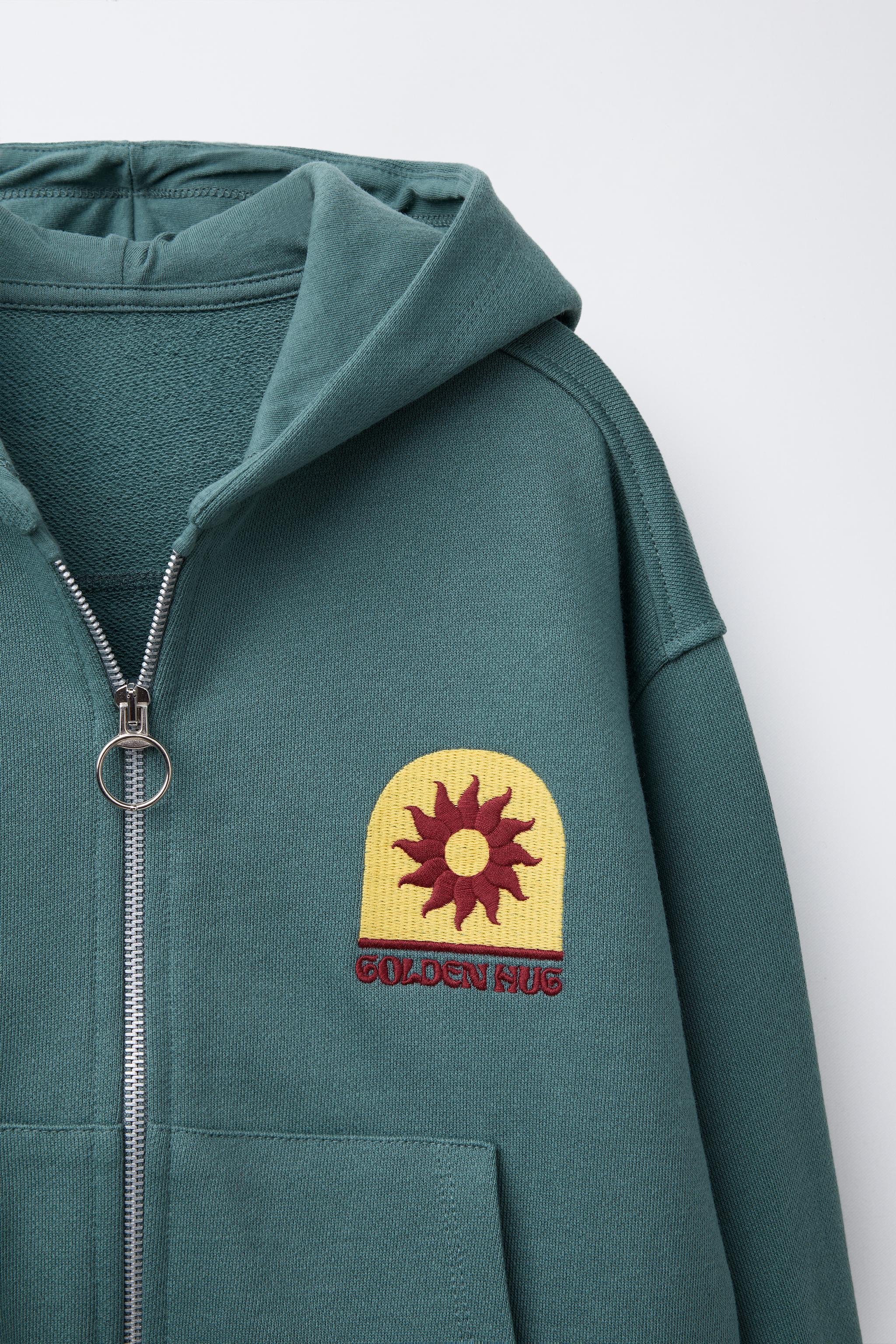 EMBROIDERED ZIP SWEATSHIRT