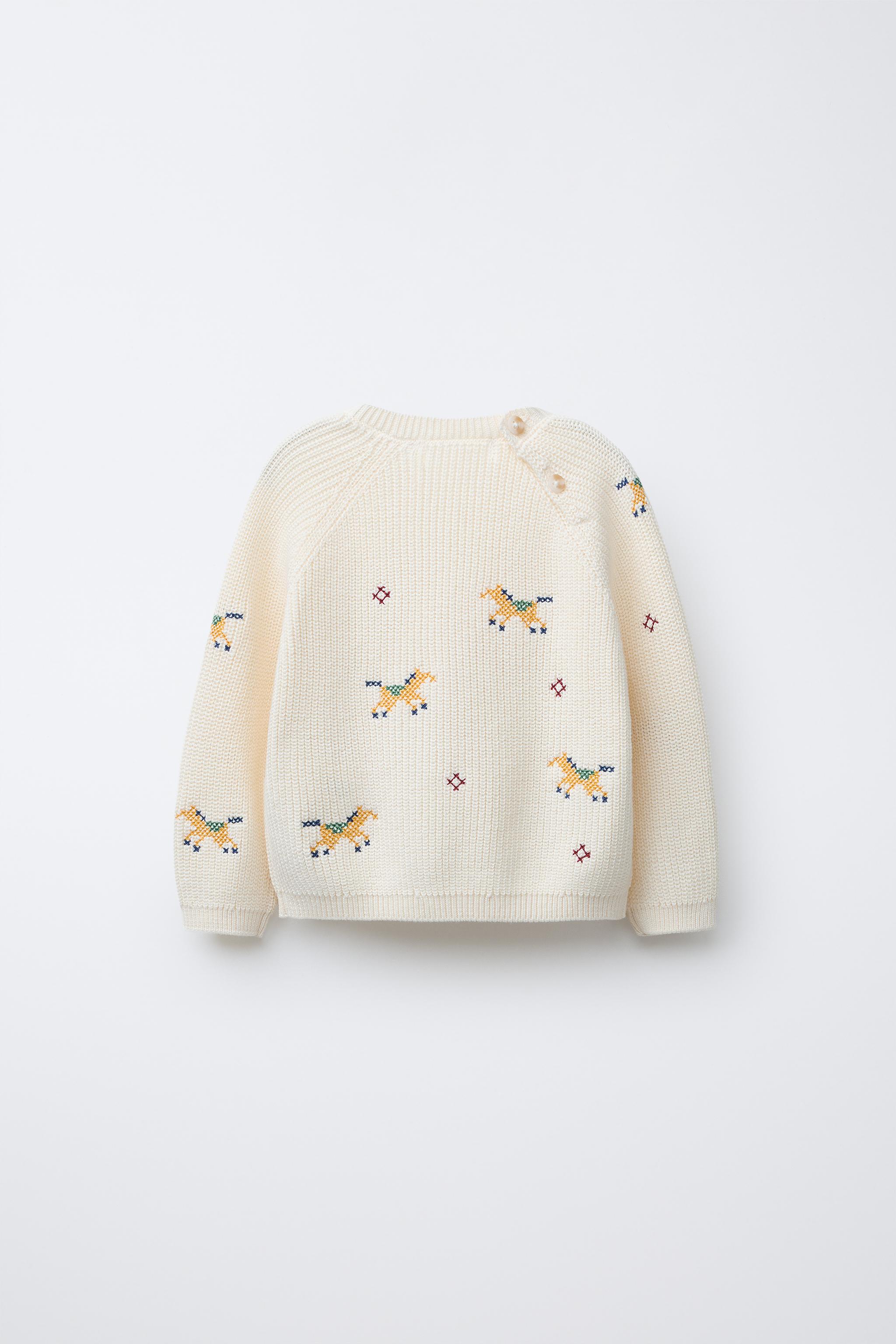 KNIT SWEATER WITH CROSS STITCH DETAILS