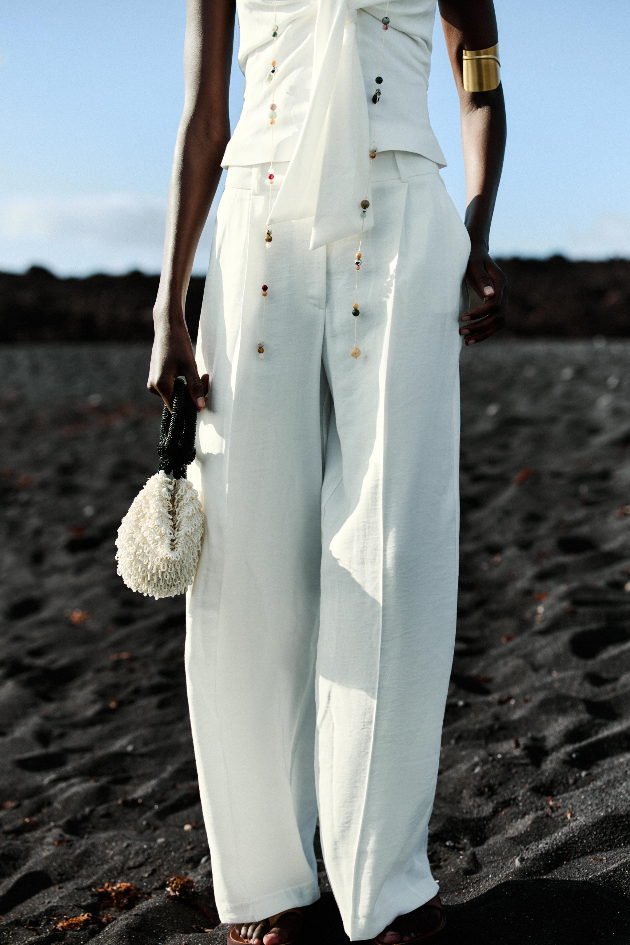 PLEATED WIDE LEG PANTS