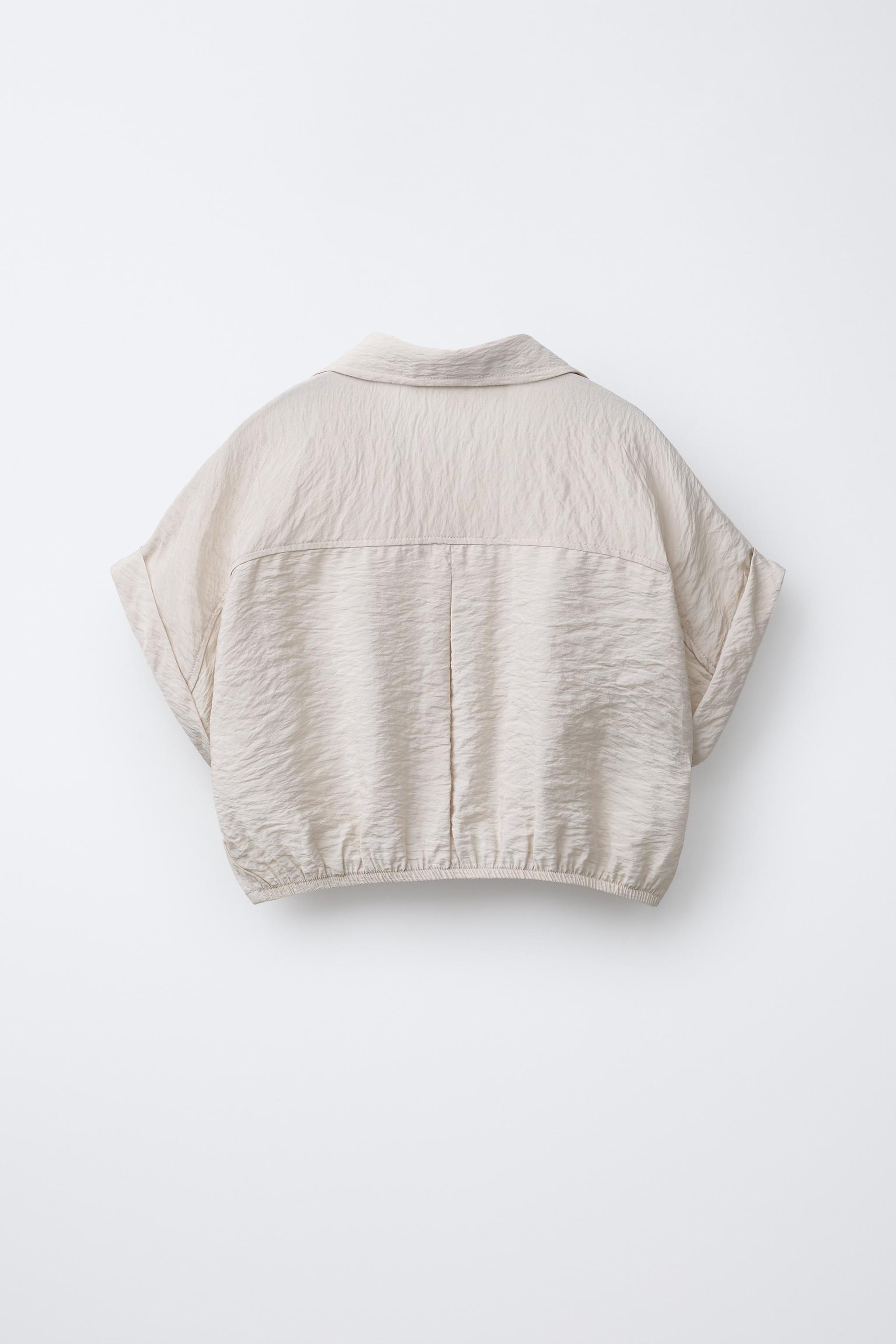 FLOWY SHIRT WITH ELASTIC