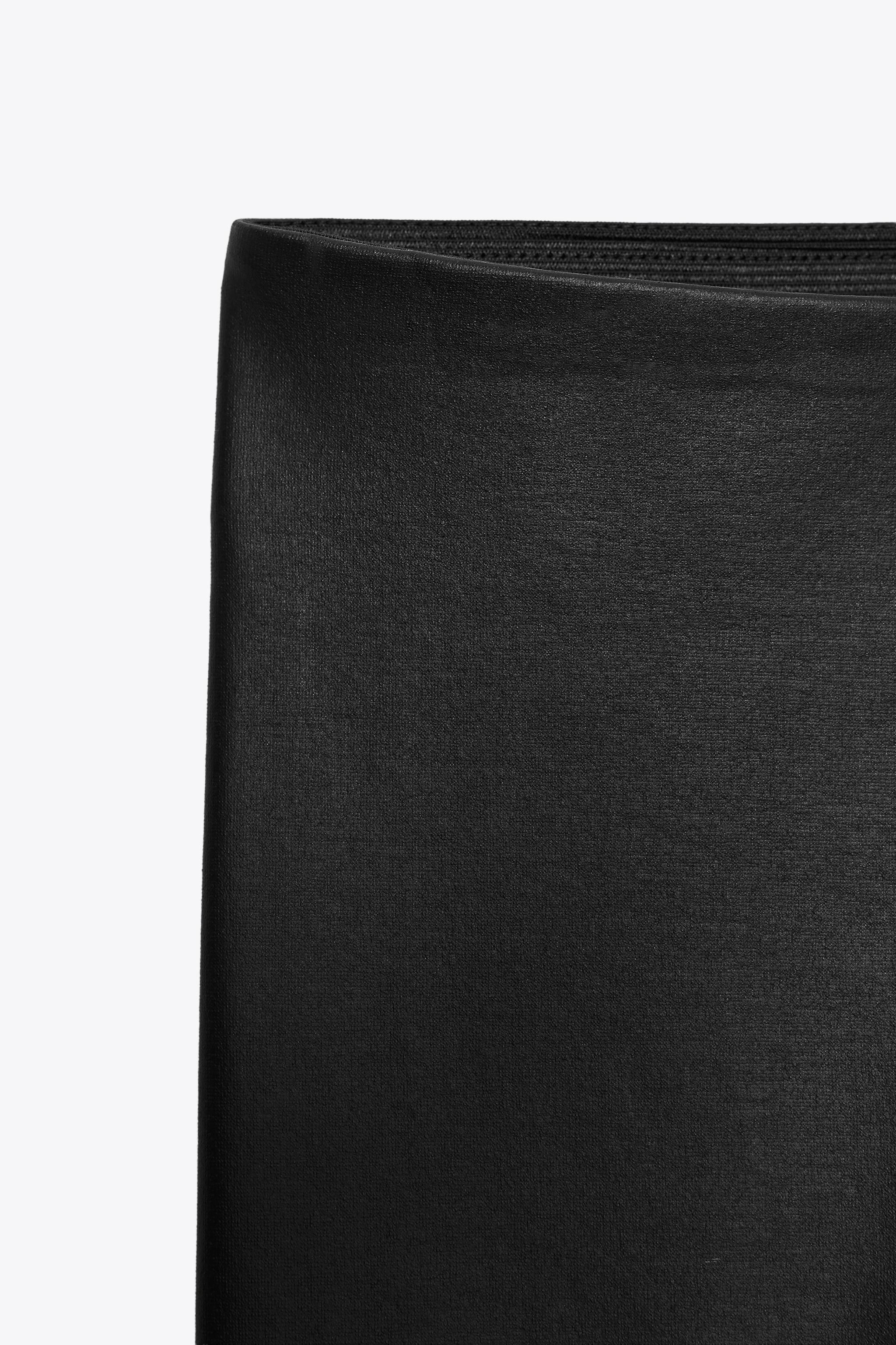 MID-RISE FAUX LEATHER EFFECT LEGGINGS