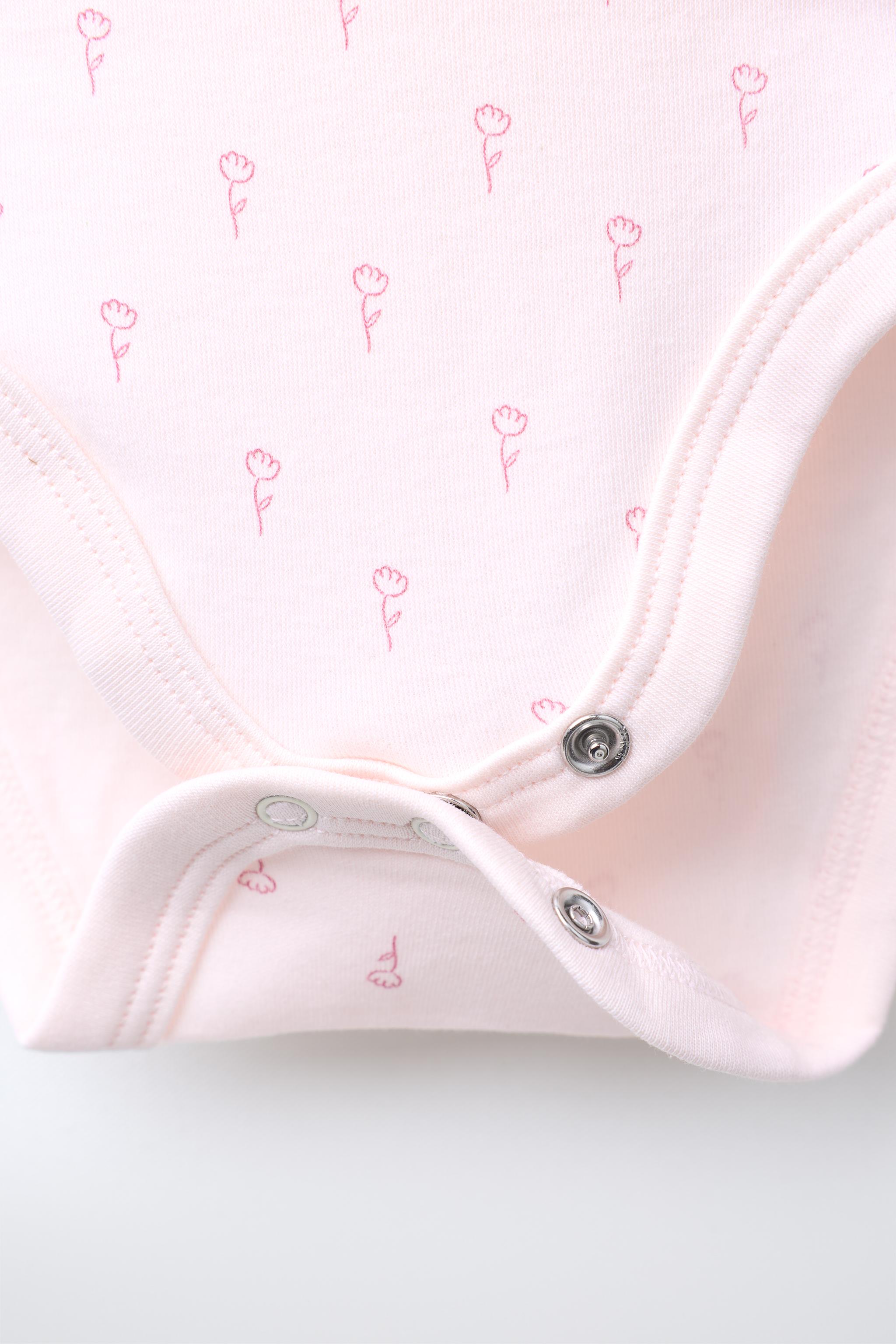 FIVE-PACK OF SWAN BODYSUITS