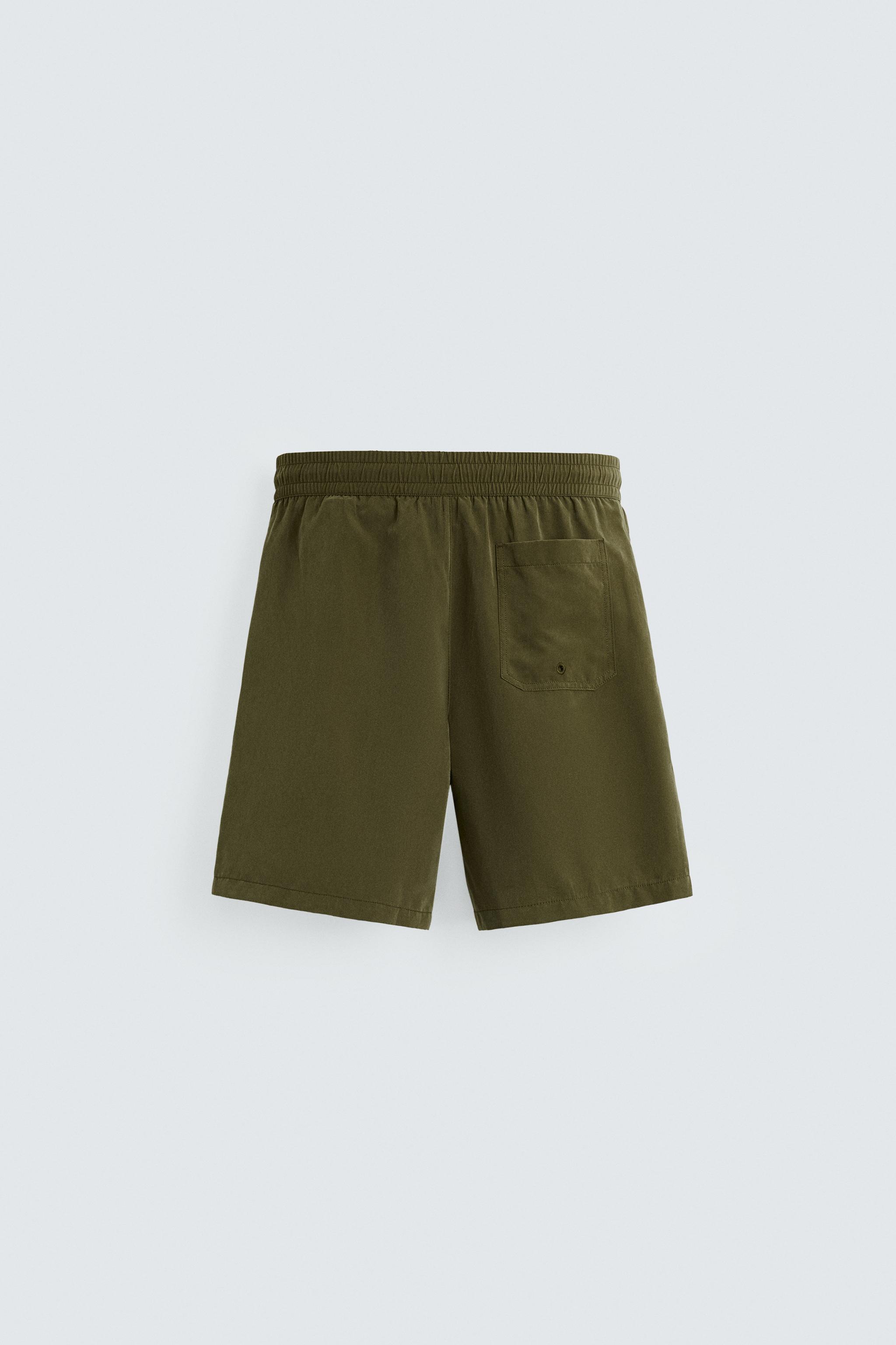 BASIC LONG SWIM TRUNKS