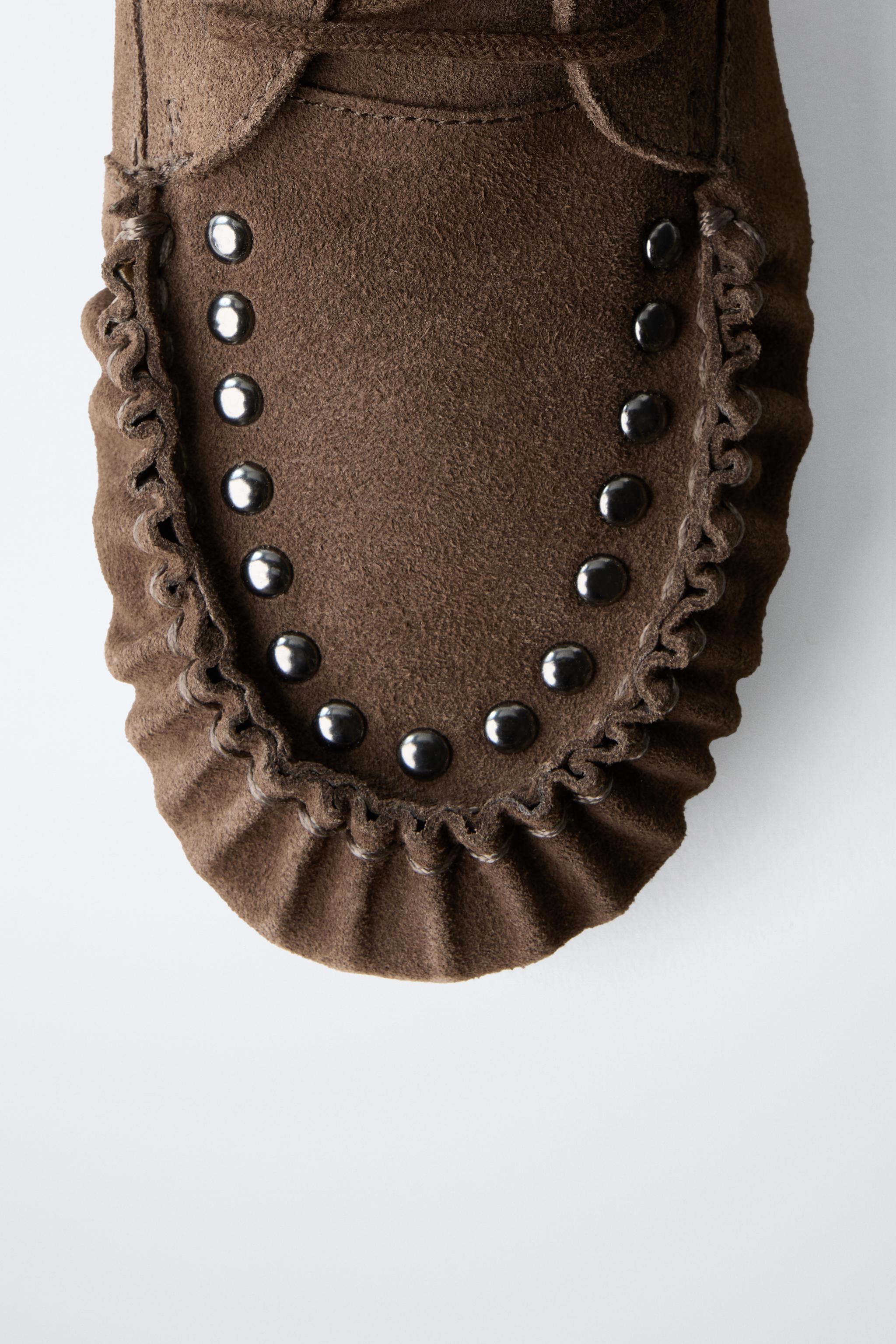 LOW-HEEL LEATHER FRINGED ANKLE BOOTS