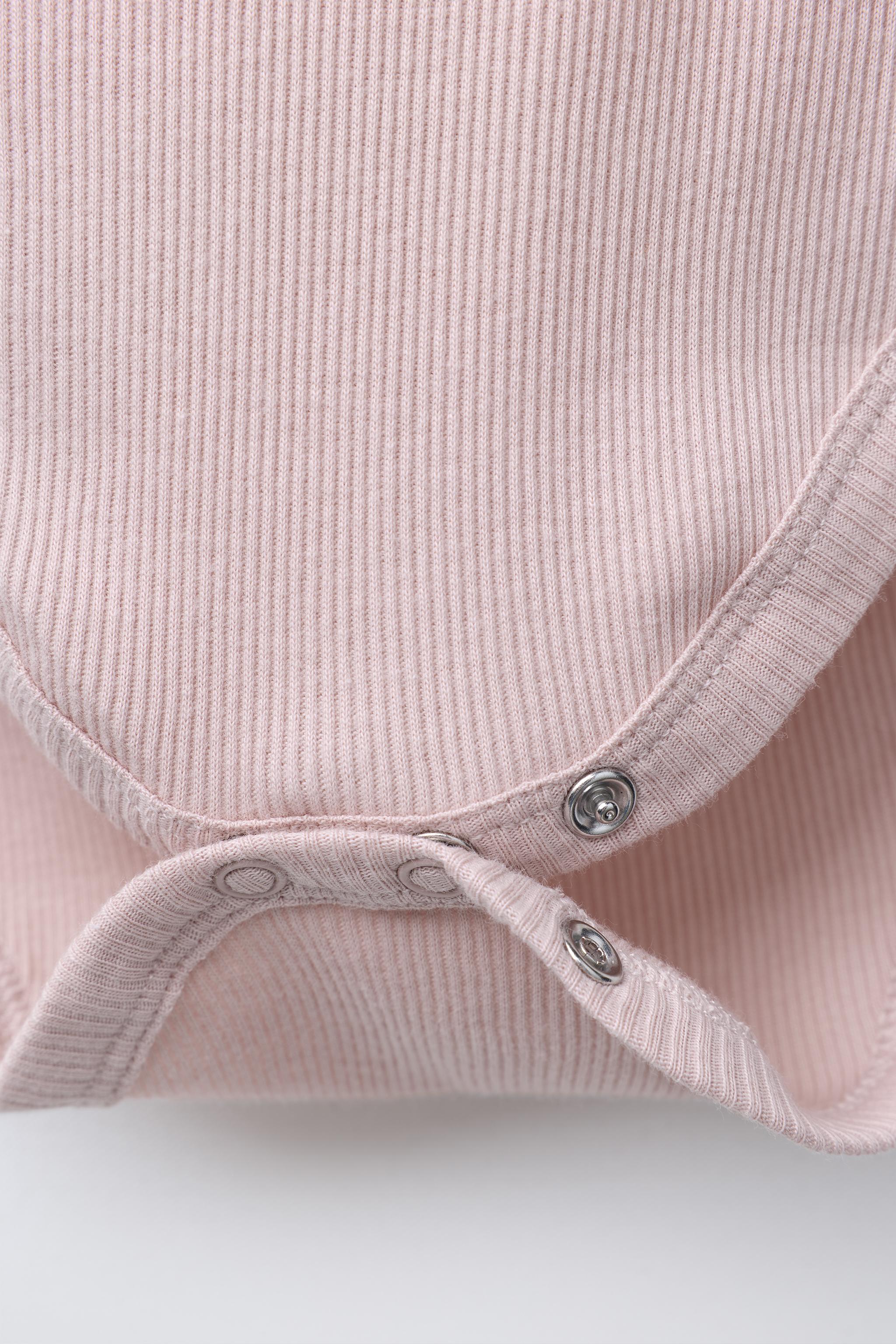 FIVE-PACK OF FLORAL BODYSUITS