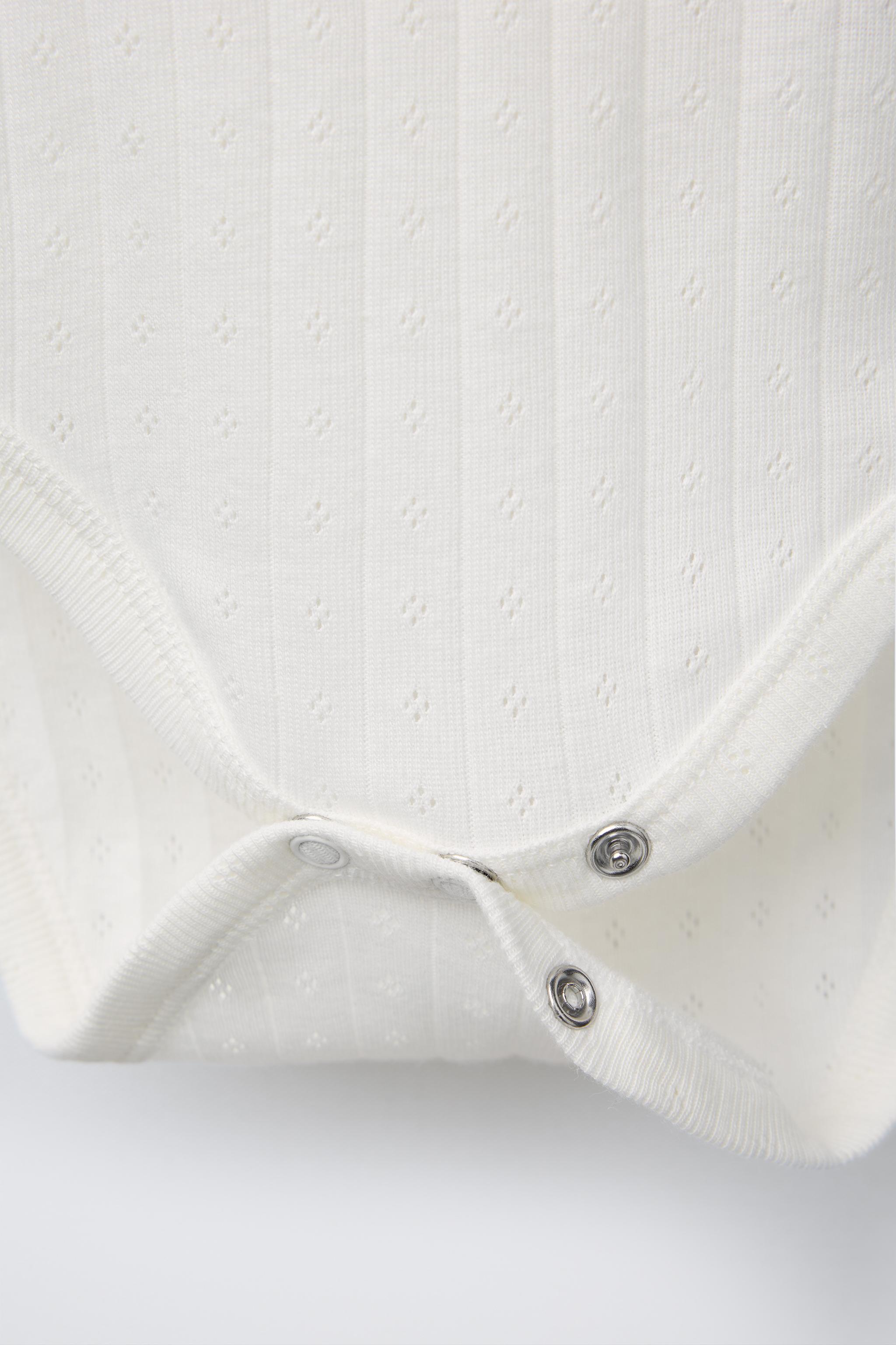 THREE-PACK OF SHORT SLEEVE BODYSUITS WITH TWIGS