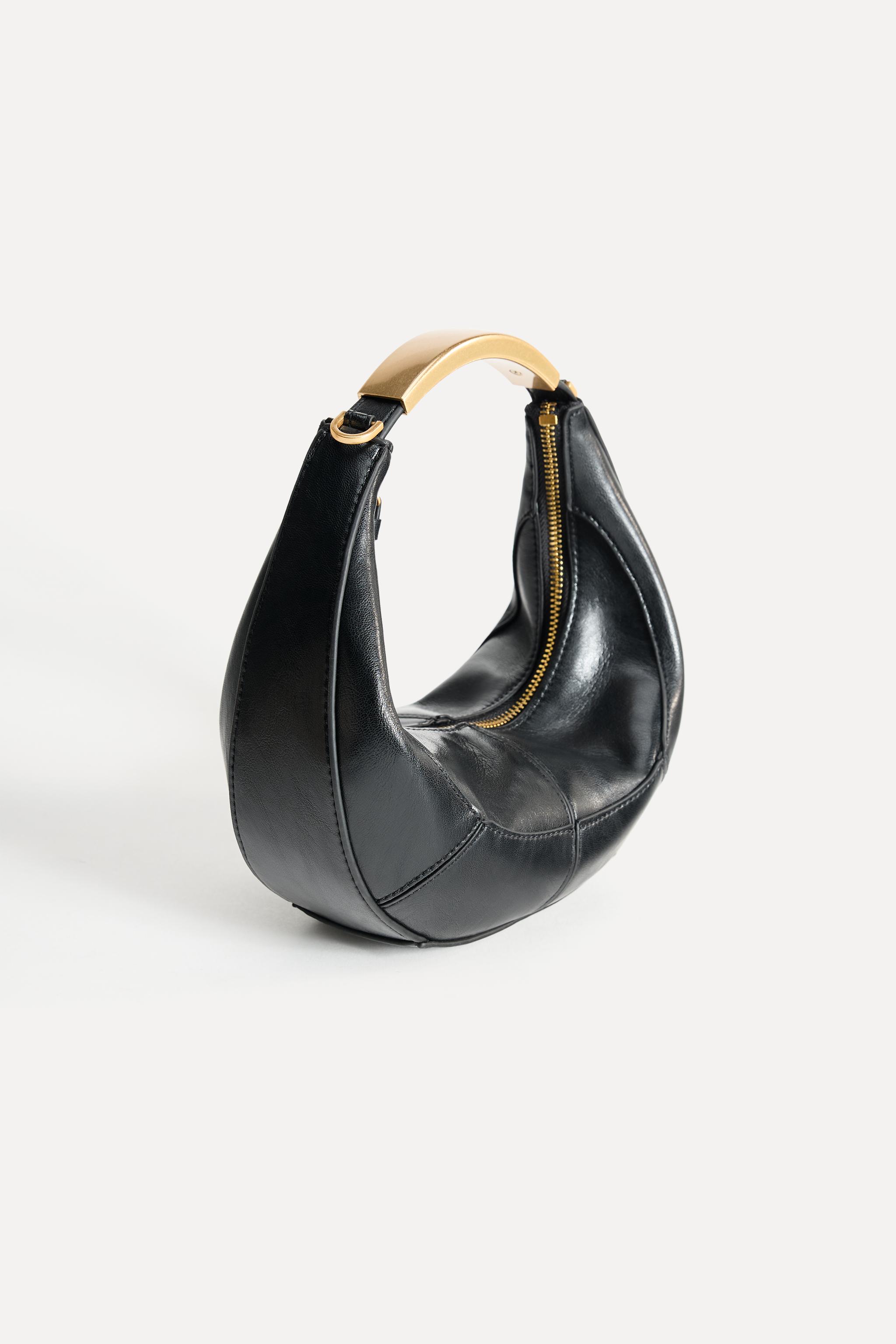 OVAL BAG WITH METAL HANDLE
