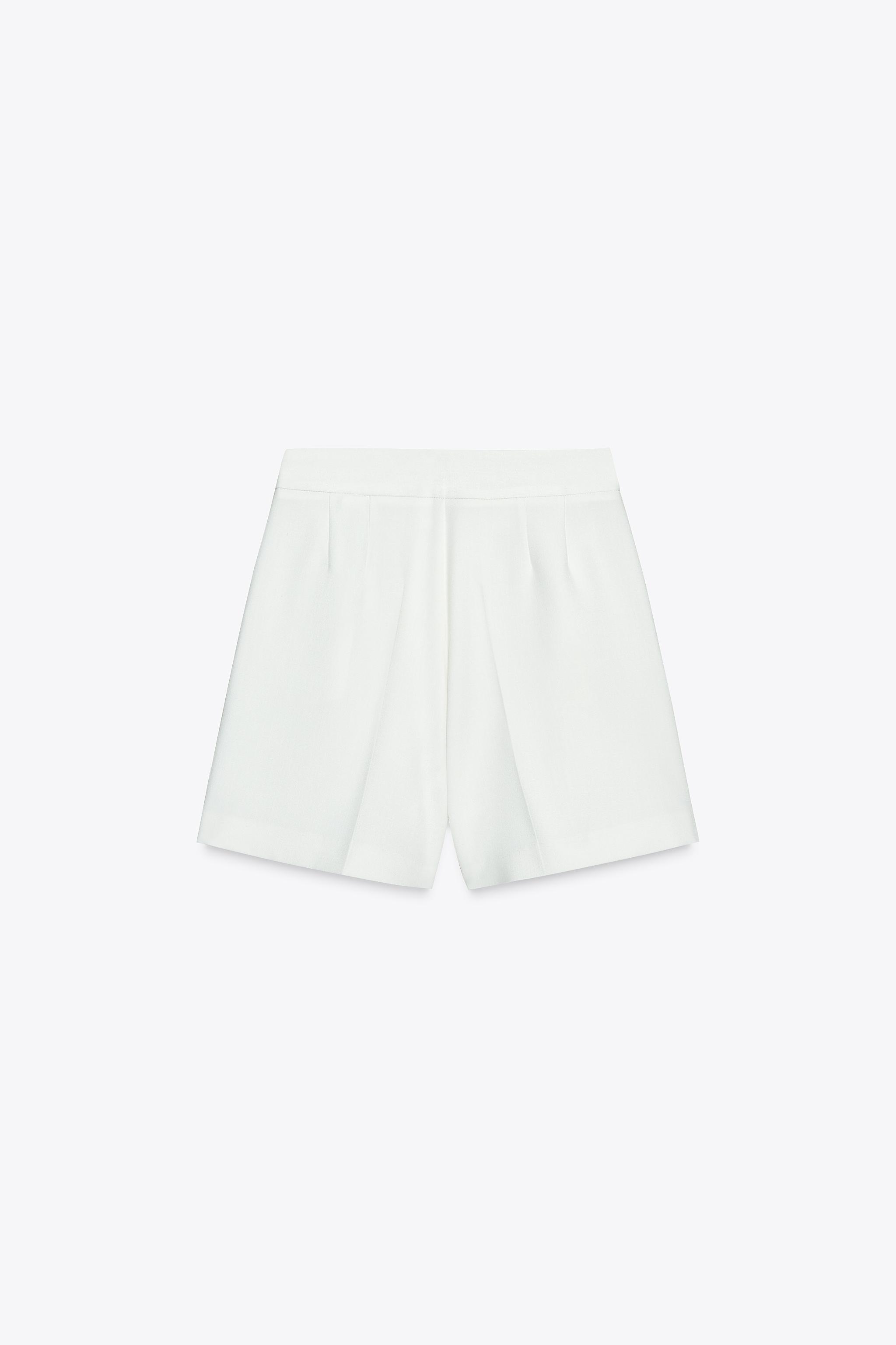 HIGH-WAISTED PLEATED SHORTS