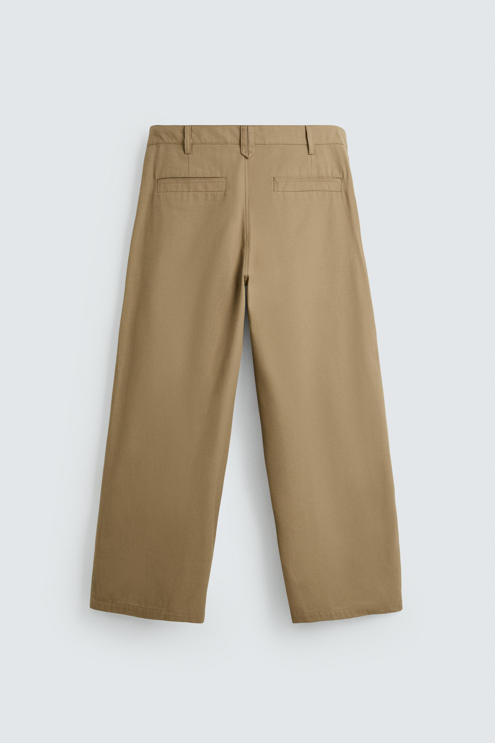 PLEATED WIDE FIT PANTS