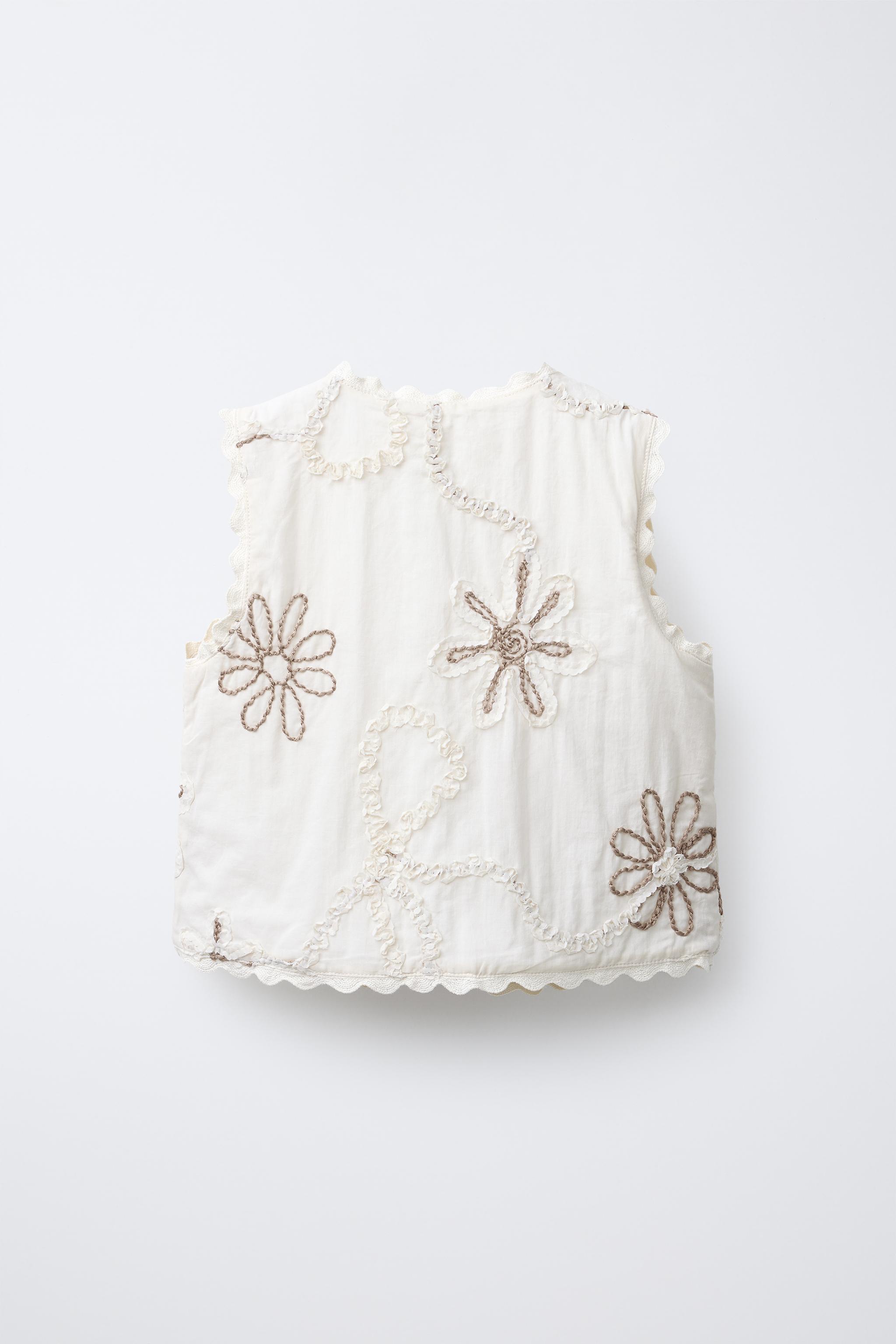 EMBROIDERED FLOWER VEST