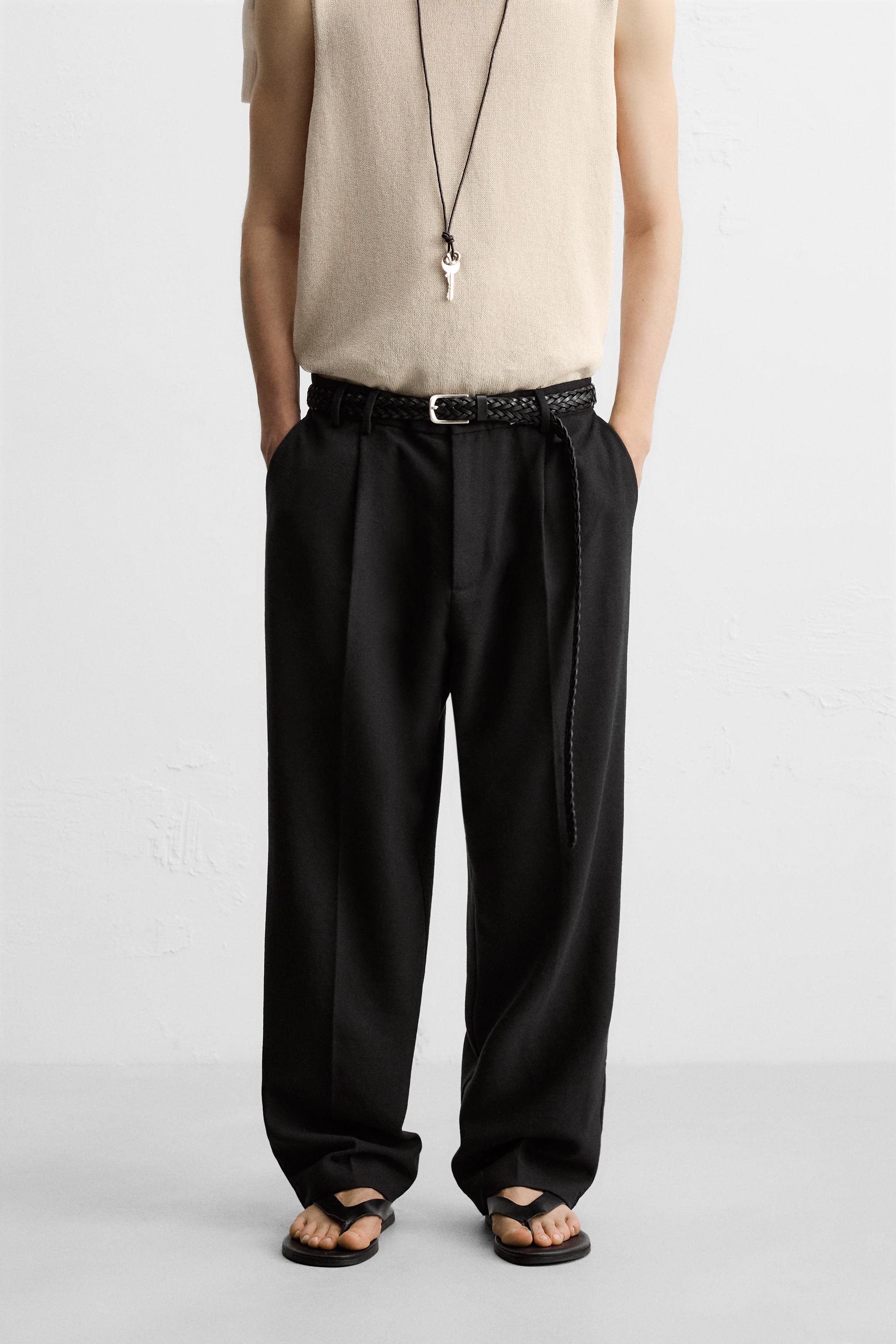 PLEATED RELAXED FIT PANTS