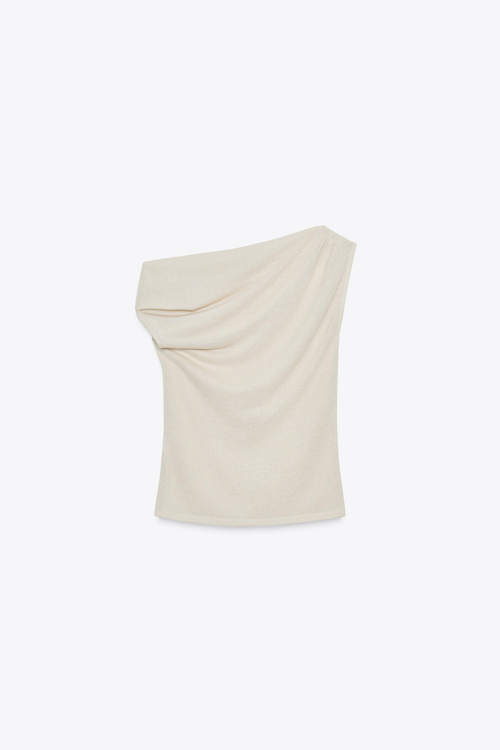 ASYMMETRIC CUT-OUT KNIT TOP