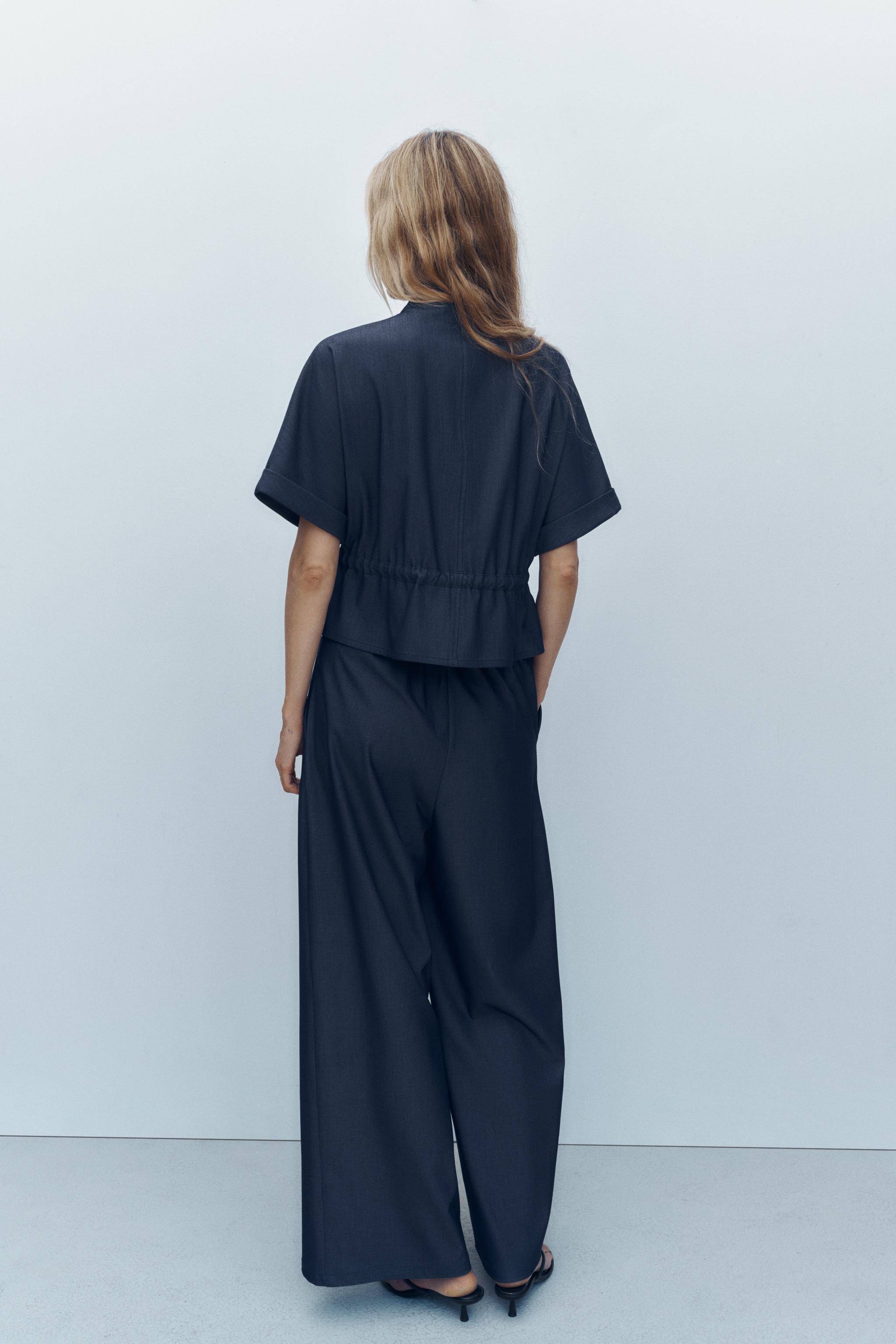 PLEATED WIDE LEG PANTS