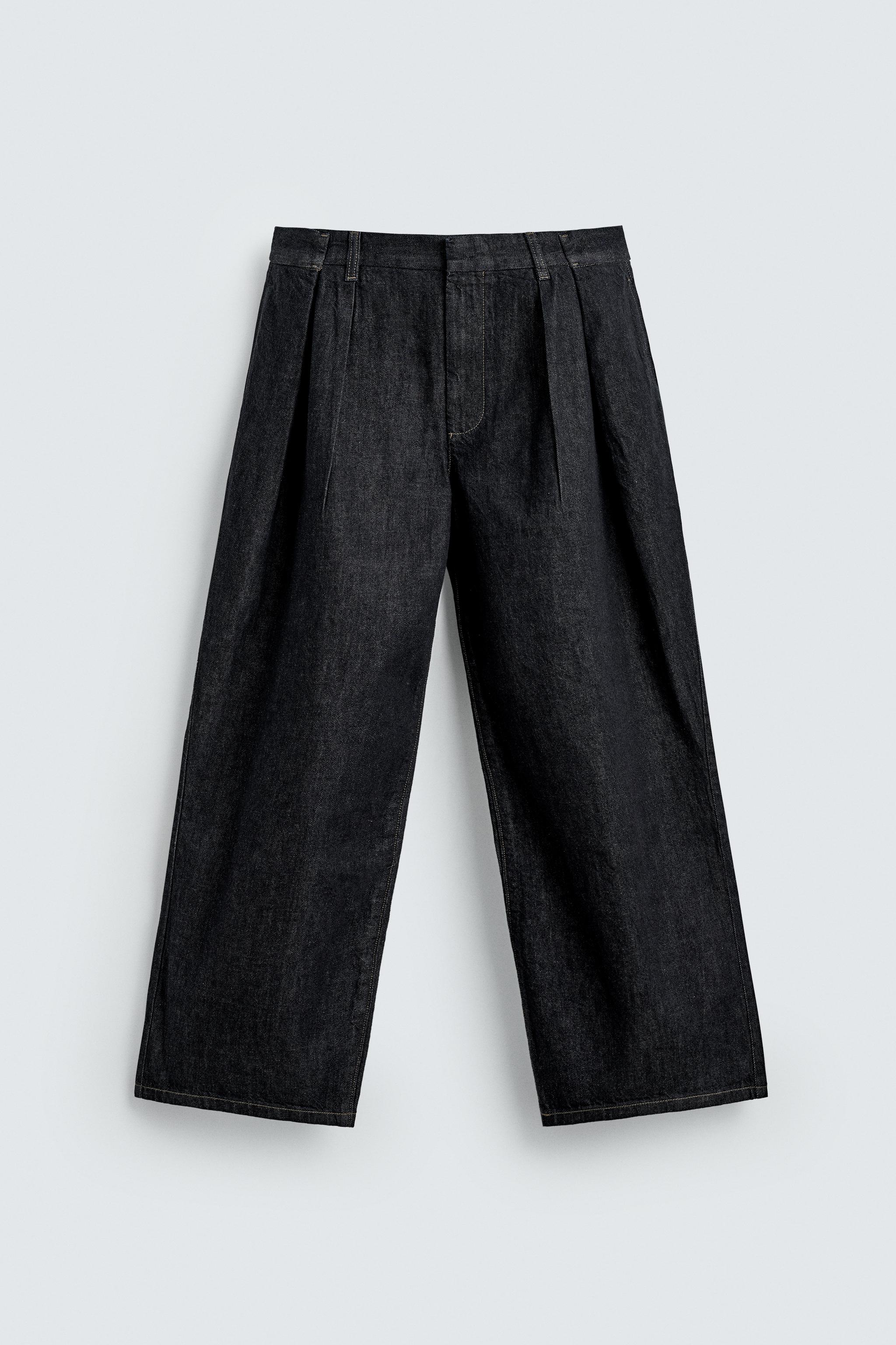 PLEATED WIDE FIT JEANS