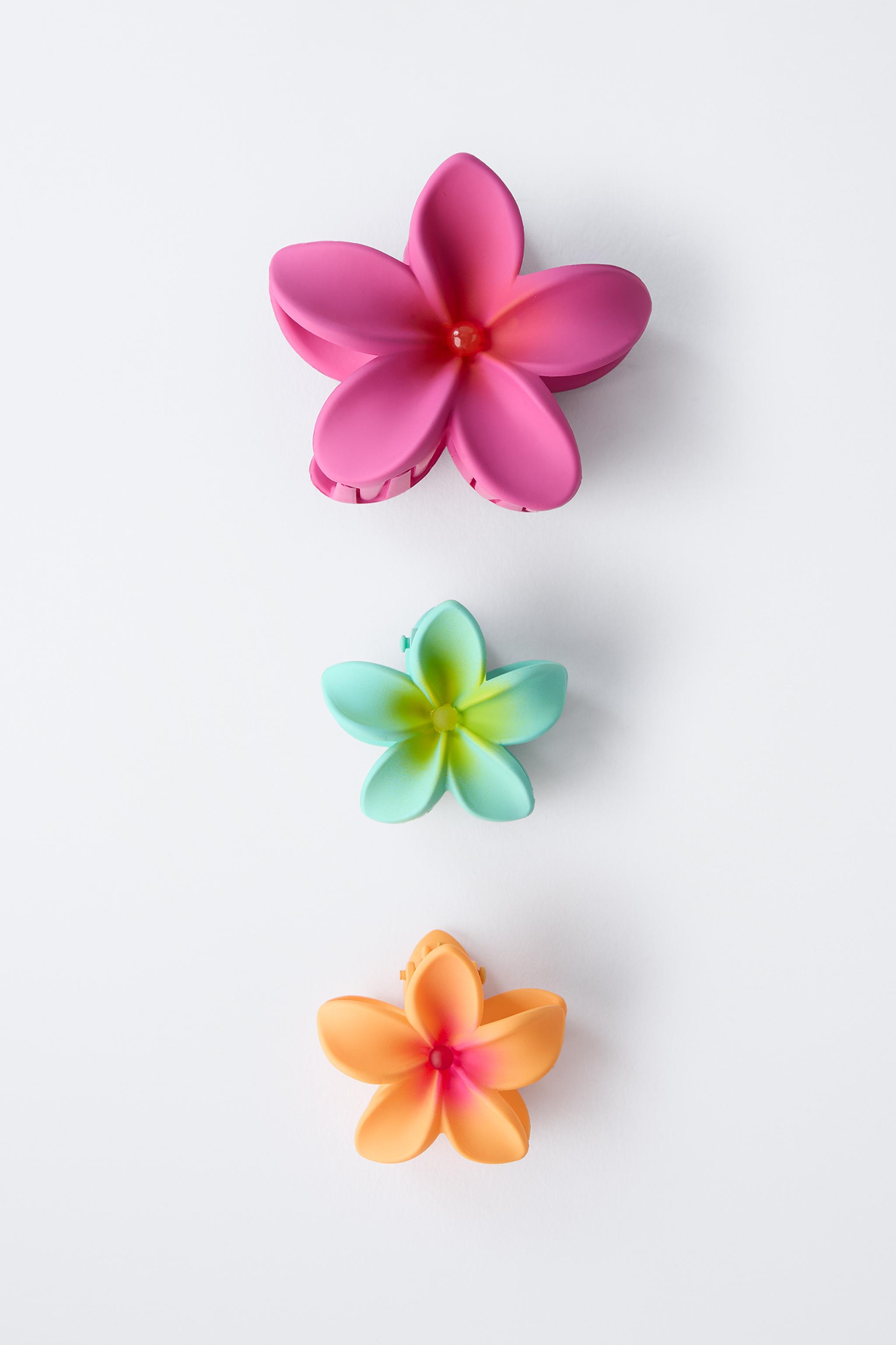 THREE PACK OF FLOWER HAIR CLIPS