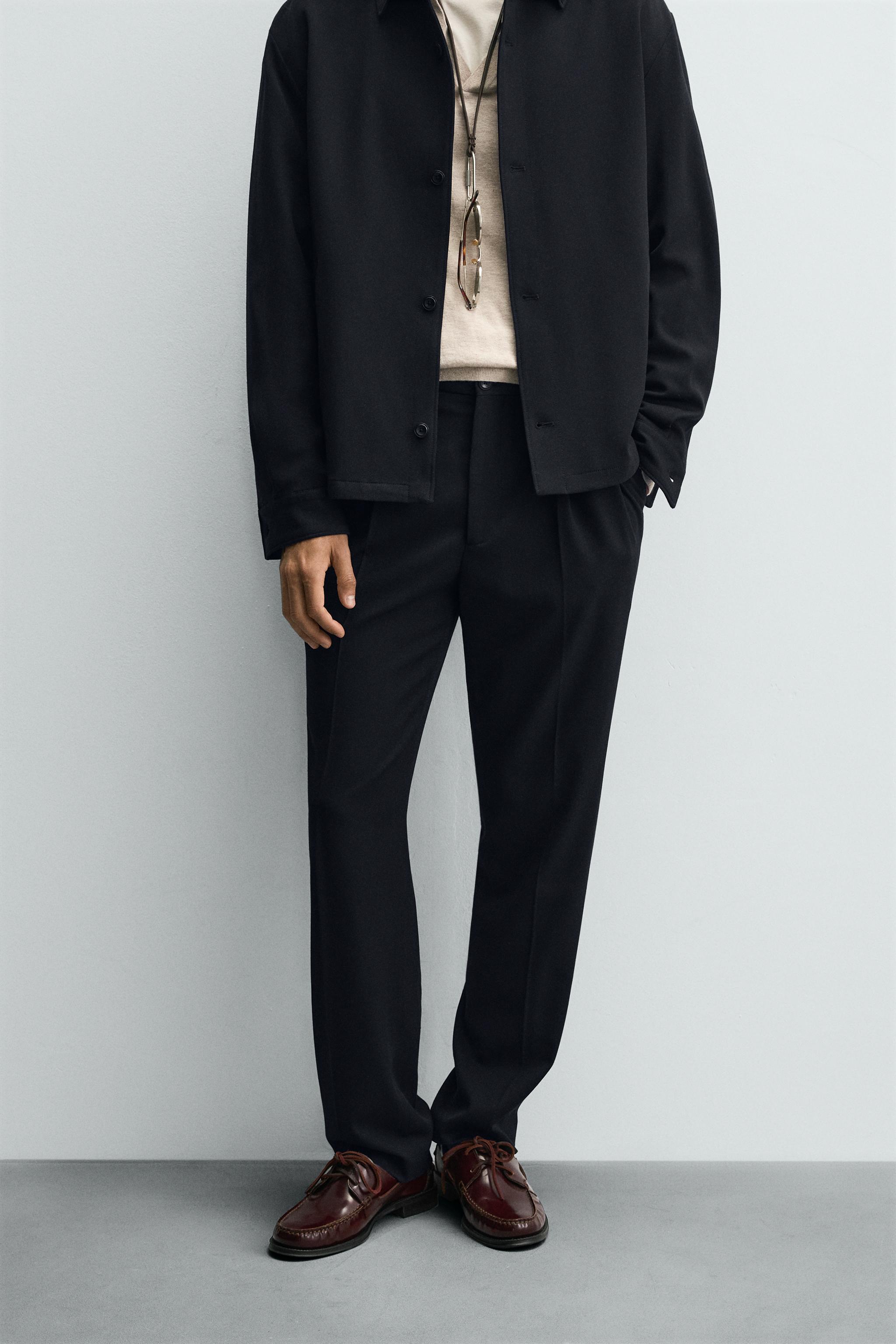 REGULAR FIT PLEATED PANTS