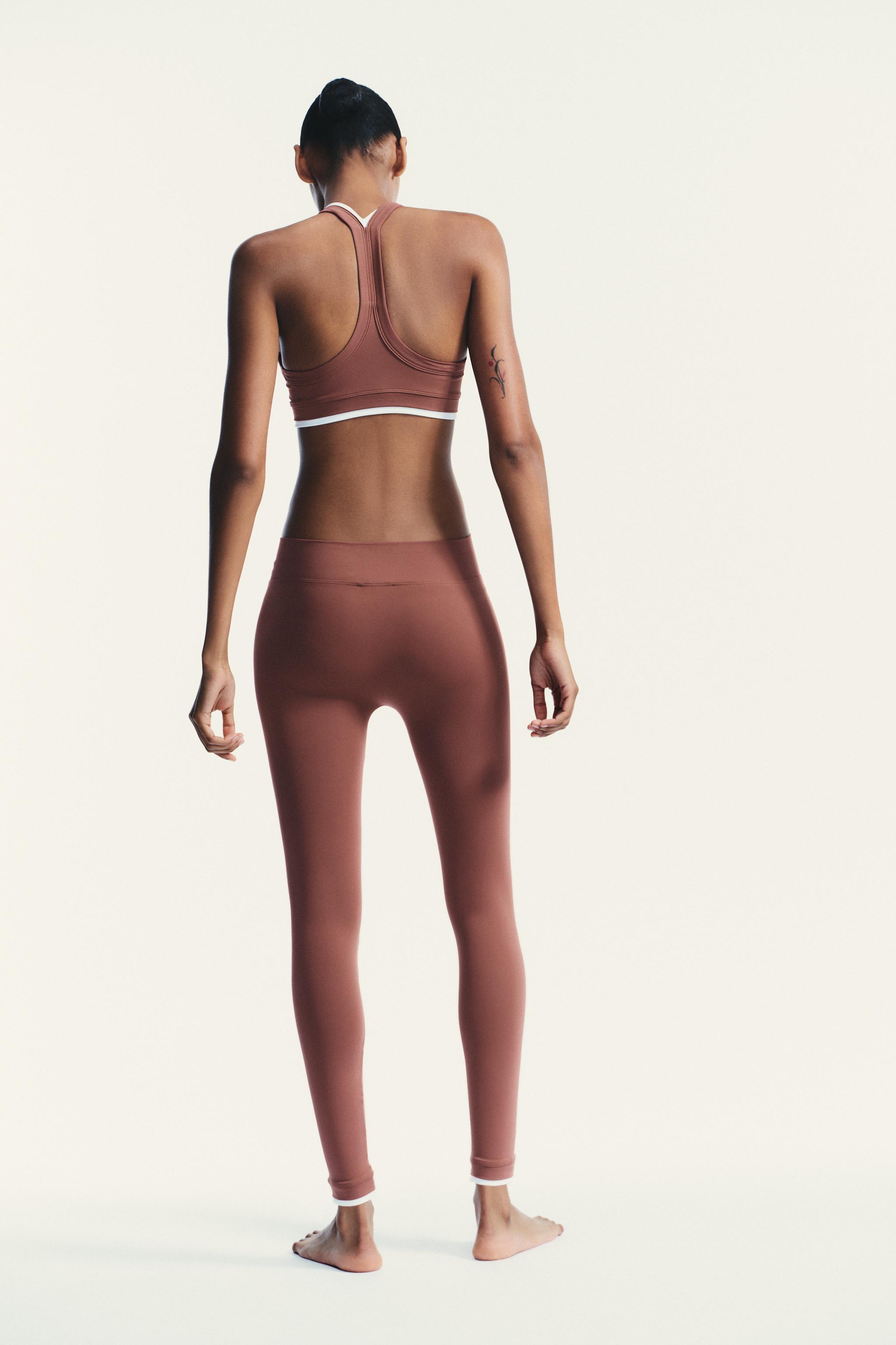 SEAMLESS ZIPPERED LEGGINGS