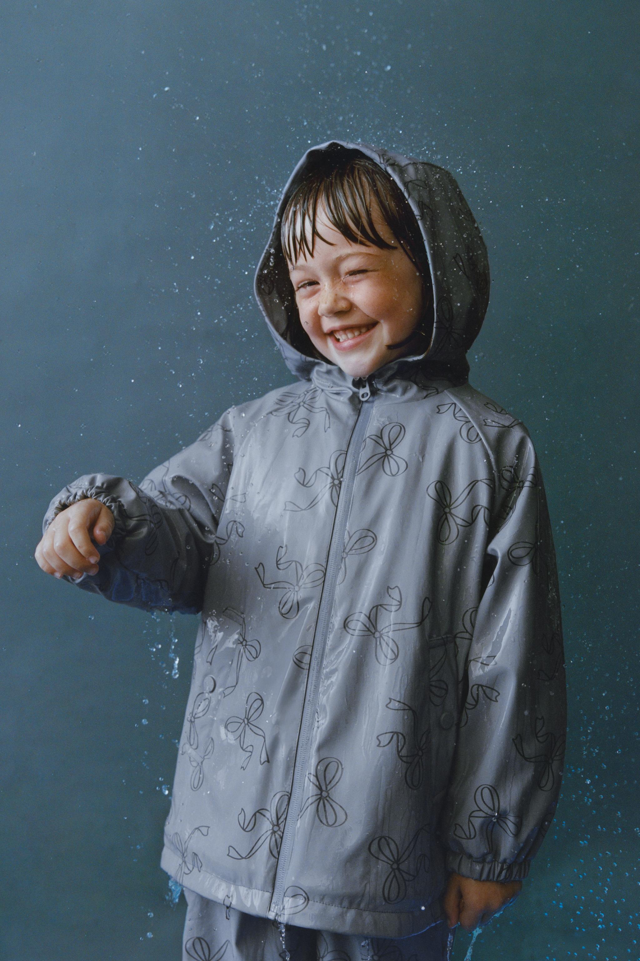 WATER RESISTANT PRINTED RUBBERIZED RAINCOAT