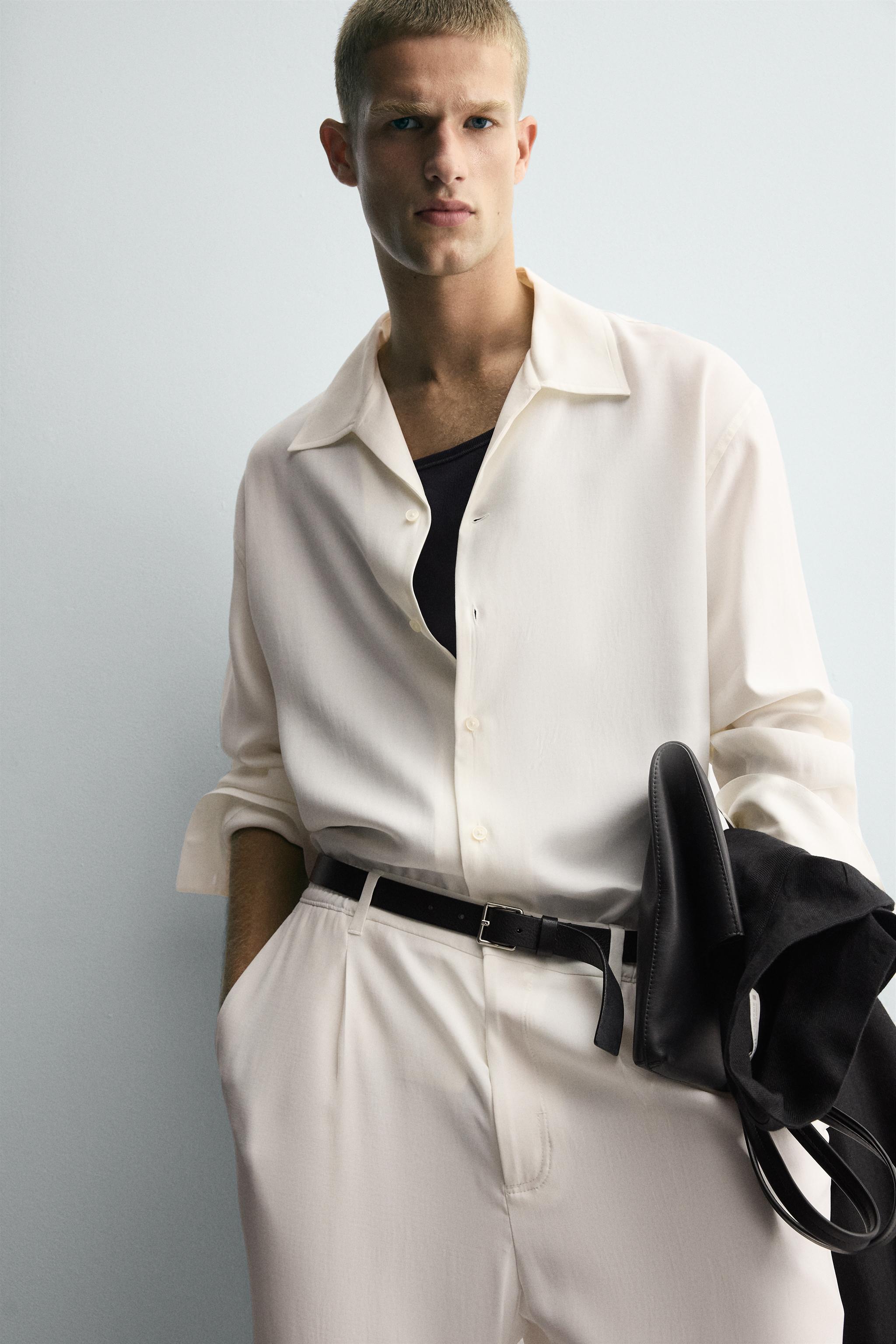 RELAXED FIT PLEATED PANTS