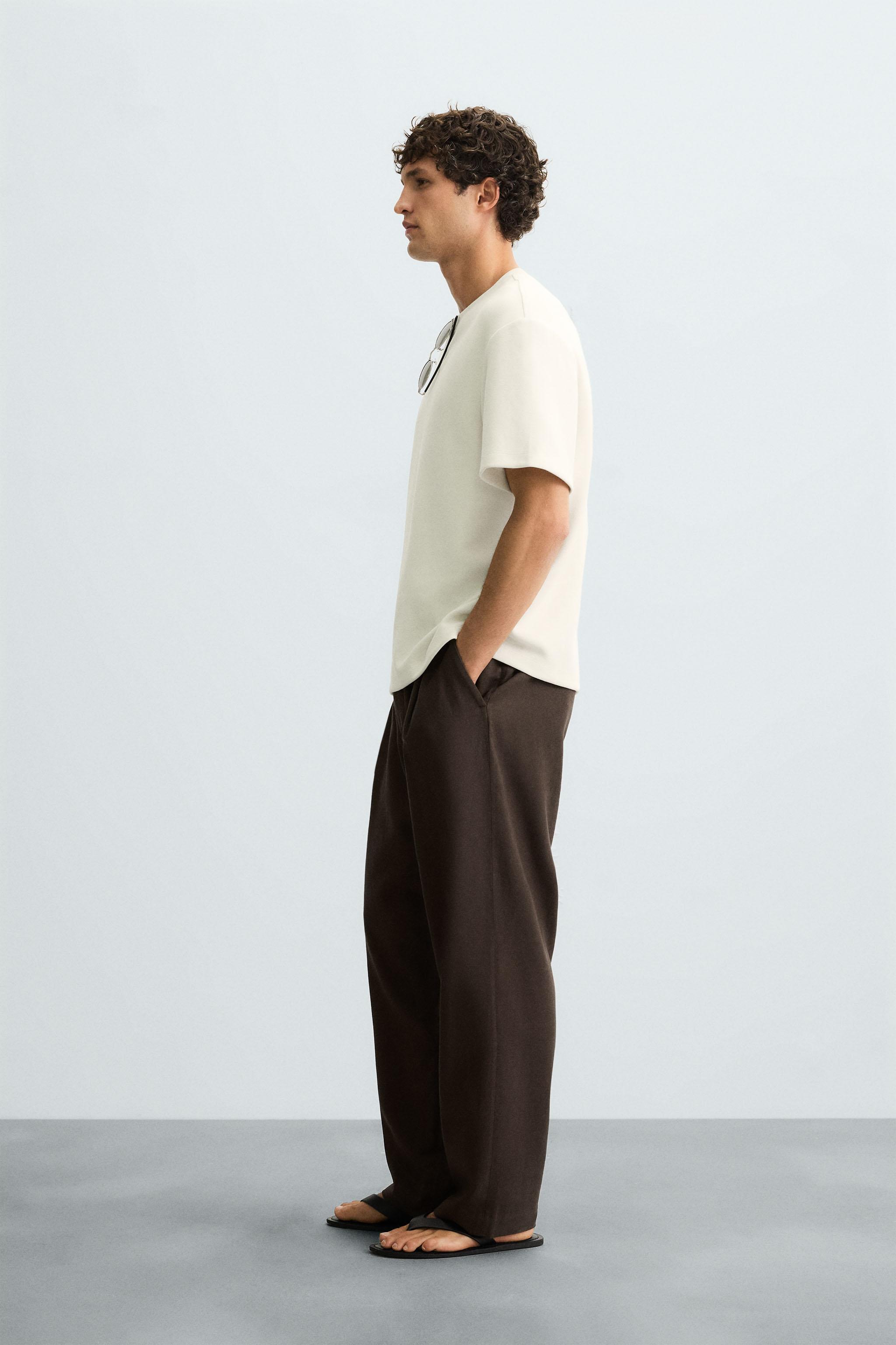 FLOWY PLEATED PANTS