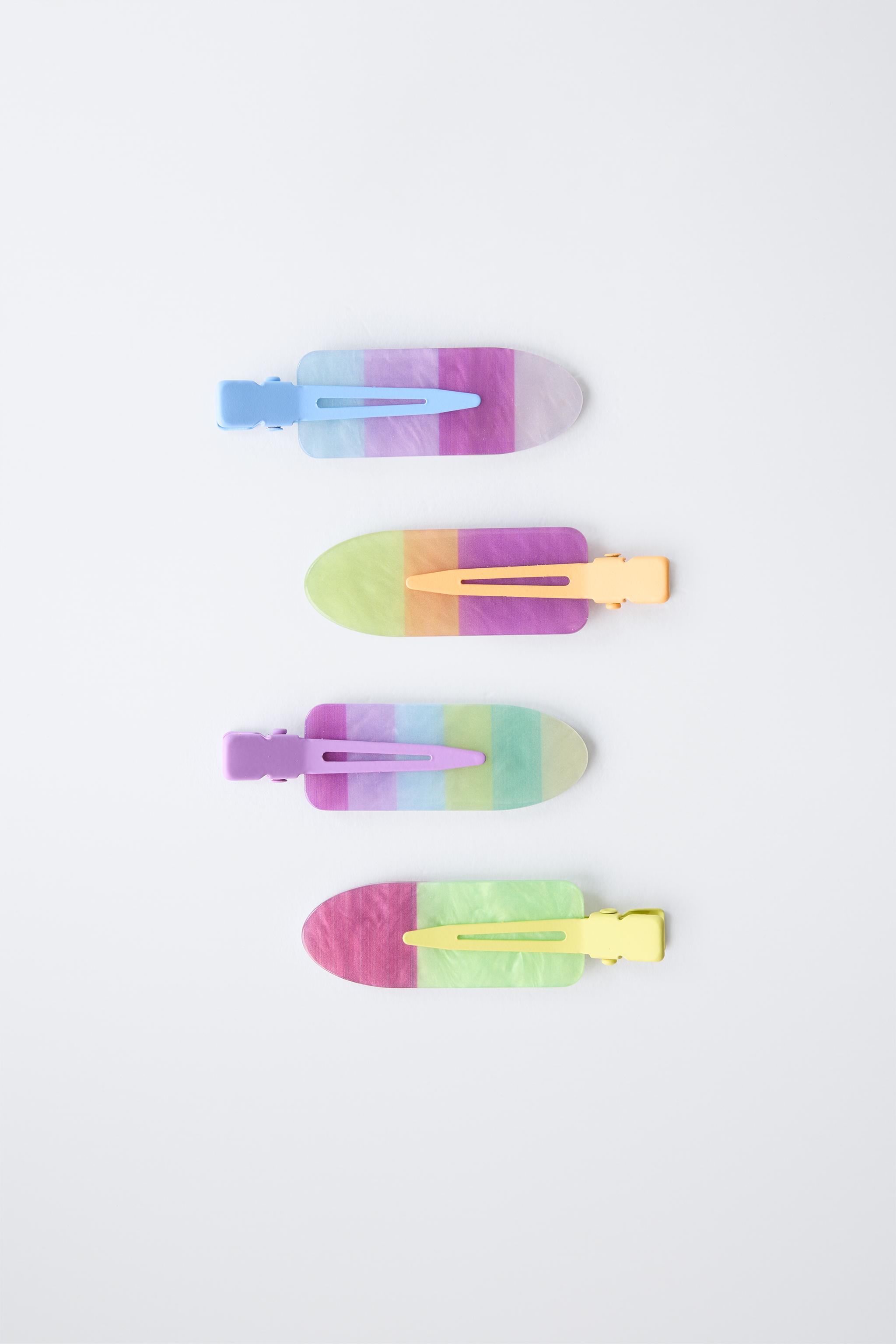 FOUR-PACK OF MULTI-COLORED BARRETTES