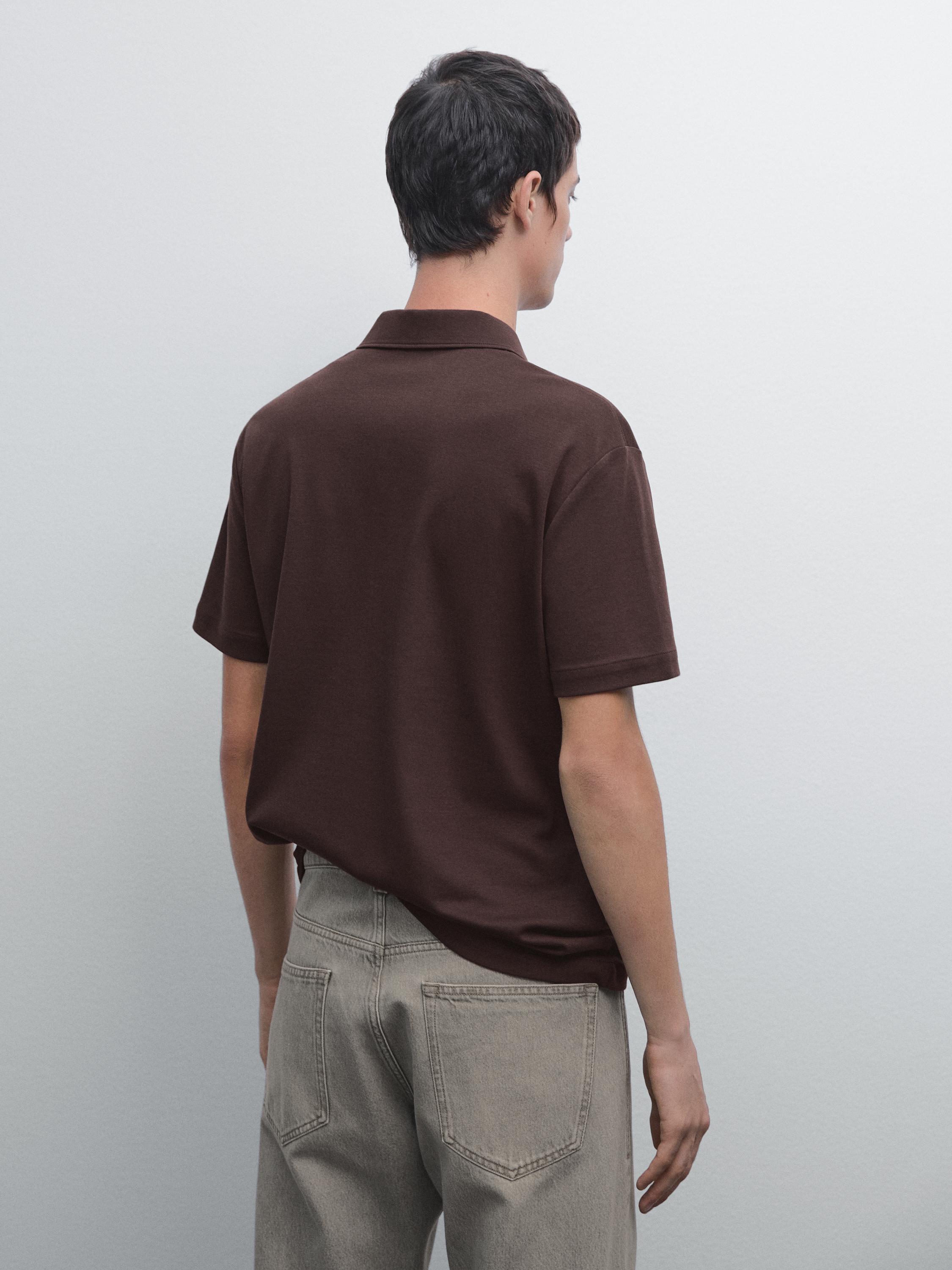Short sleeve polo shirt with snap-button placket