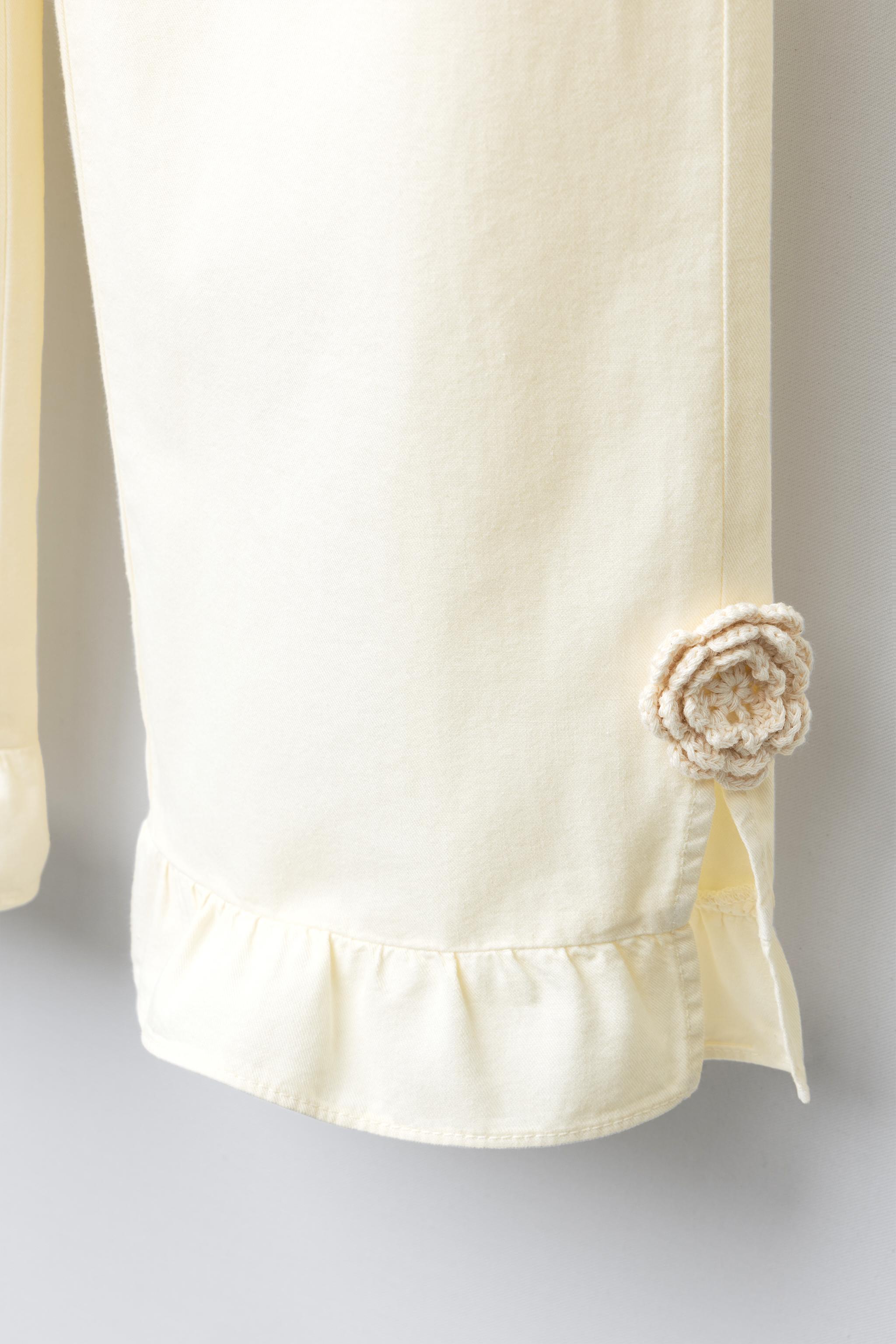 WIDE LEG PANTS WITH CROCHET FLOWER RUFFLES