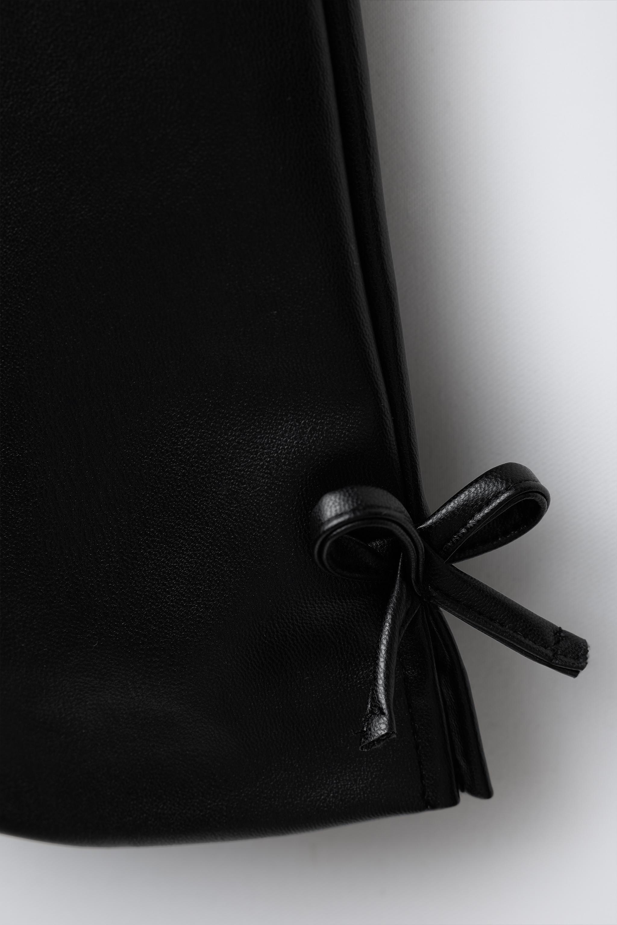 FAUX LEATHER STRAIGHT LEG PANTS WITH BOWS