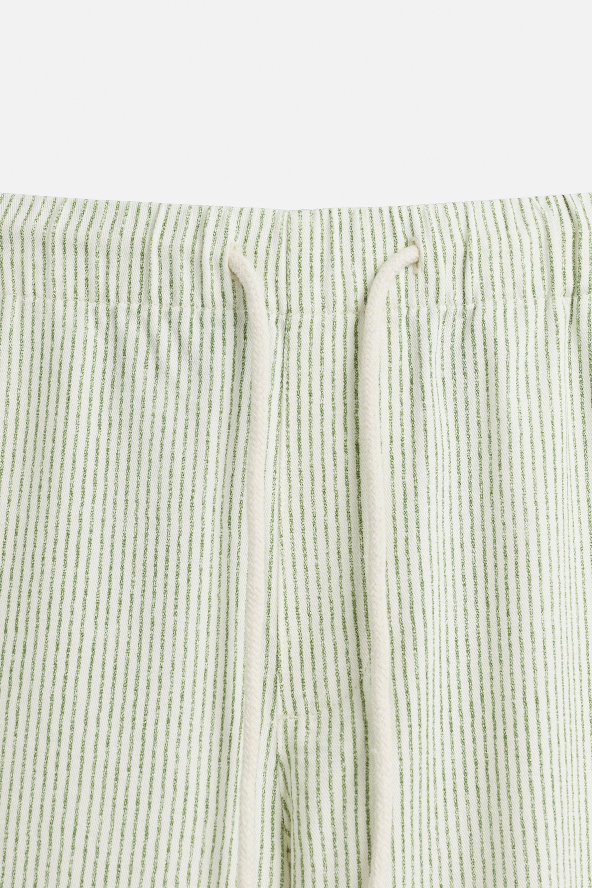 STRIPED BAGGY FIT PANTS